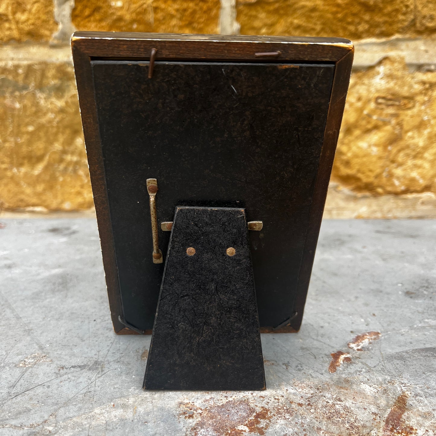 A vintage British Art Deco 'Foframe' wooden photo frame with a distinctive geometric design and richly toned wood finish. Dating from the 1930s–1940s, the frame features clean lines and stepped Art Deco styling