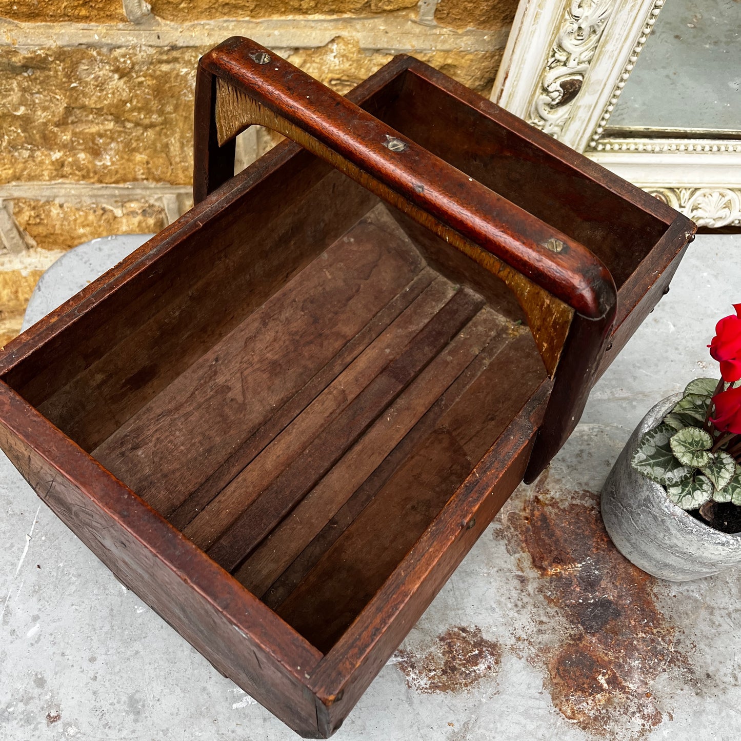 Wooden French vintage trug featuring subtle marquetry detailing on the handle. The trug has a rustic, hand-crafted appearance with a sturdy handle and gently aged finish, reflecting traditional French country style.