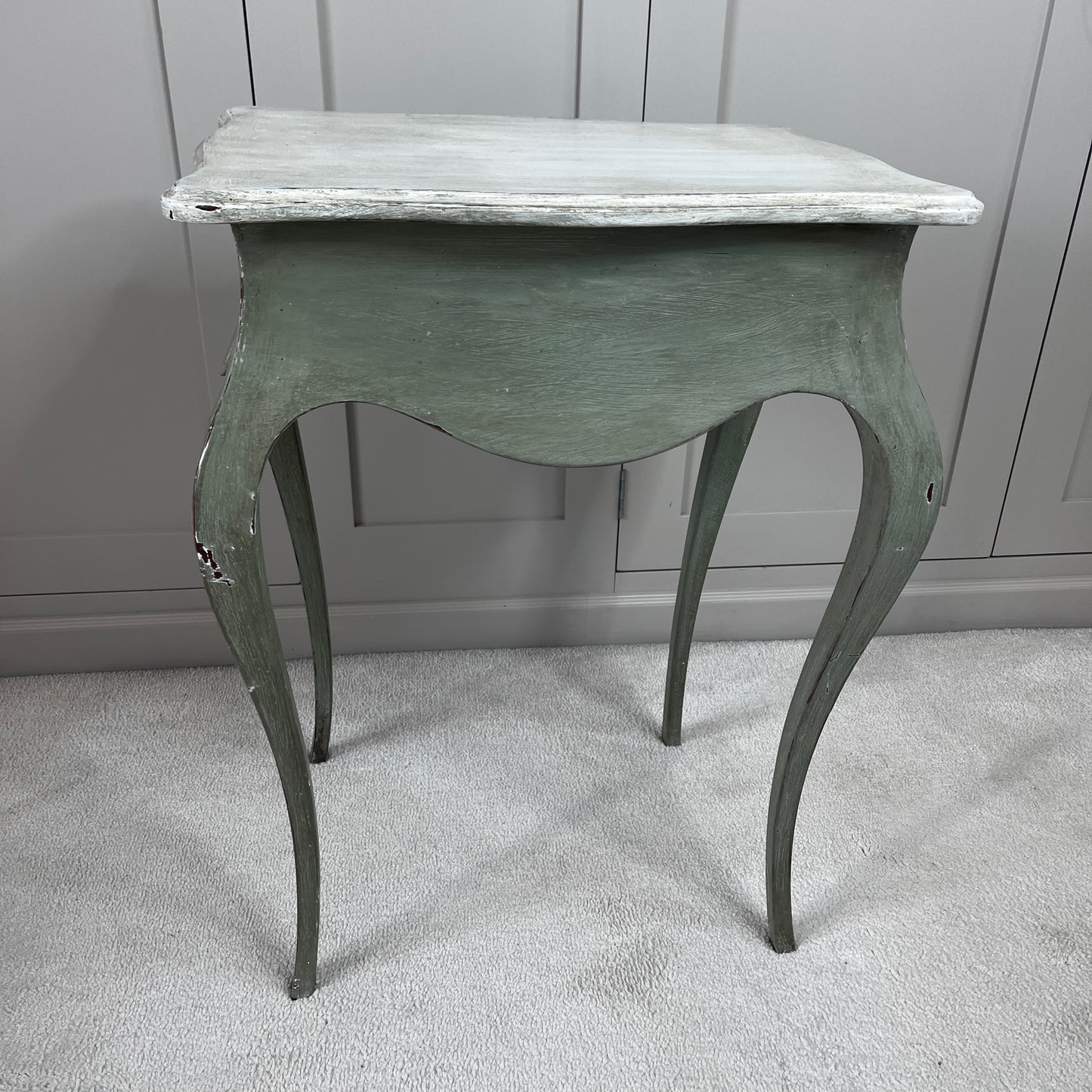 Gustavian-style bedside table with a single drawer, painted green with a contrasting off-white top, featuring simple classical lines and a softly distressed vintage finish.