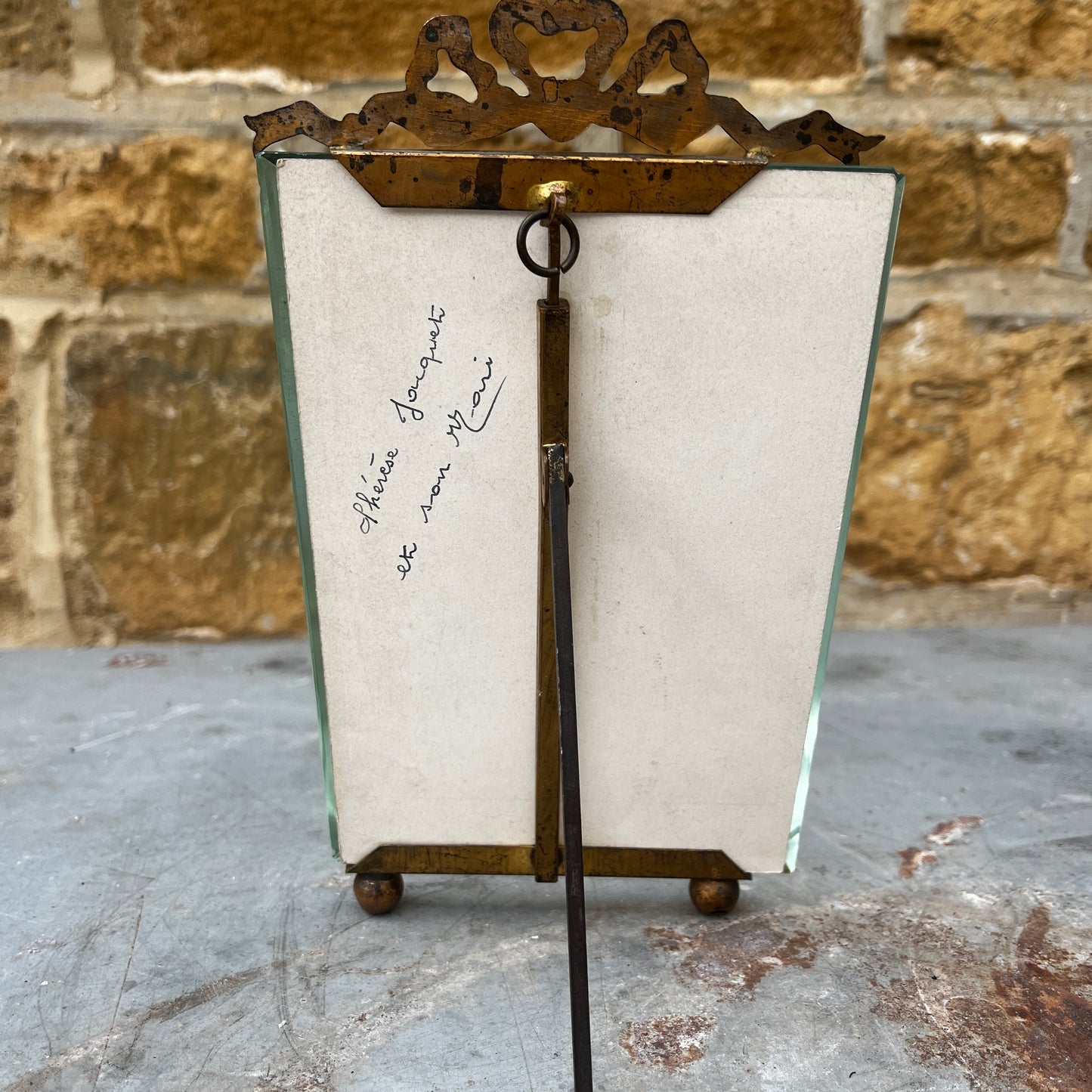 Antique French bevelled glass photo frame with an elegant vintage design and decorative detailing