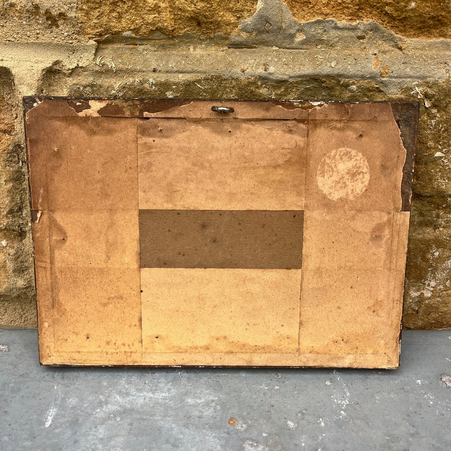 Back of vintage framed painting