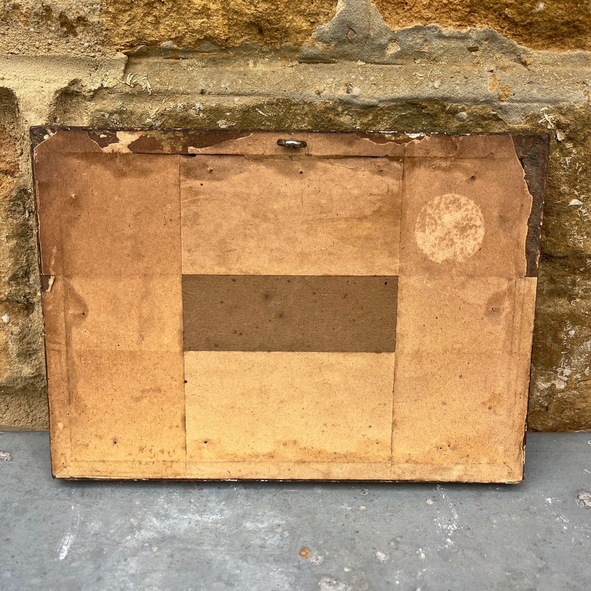 Back of vintage framed painting