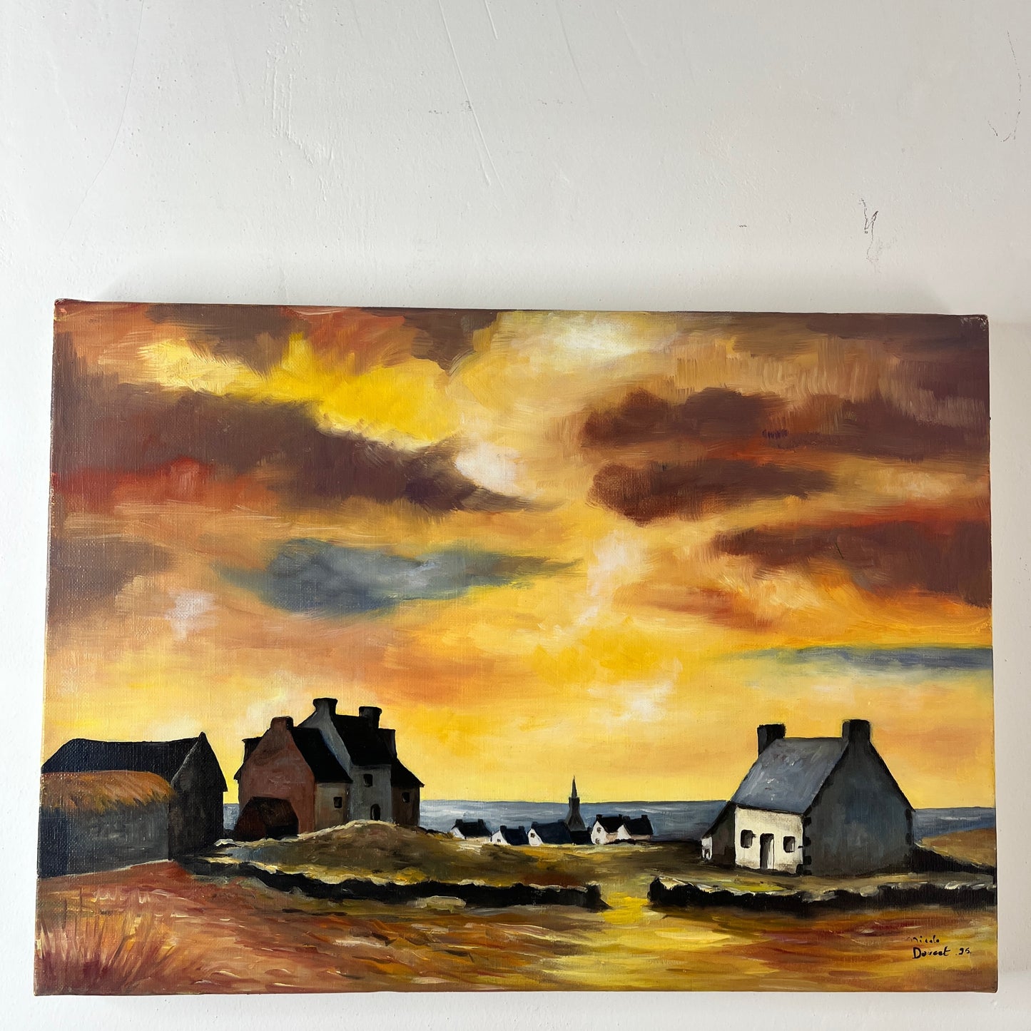 An oil on canvas painting depicting a vibrant Brittany sunset, with warm hues of orange, yellow, and blue blending into the horizon over a calm sea.
