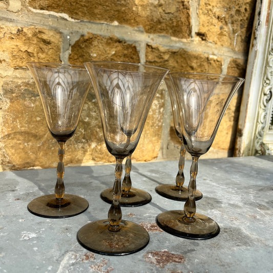 A set of five vintage Orrefors Rhapsody smoke wine glasses, designed by Sven Palmqvist for Orrefors, Sweden, circa 1959. These hand-blown, mid-century Scandinavian glasses feature a sleek, minimalist silhouette with a slightly flared bowl