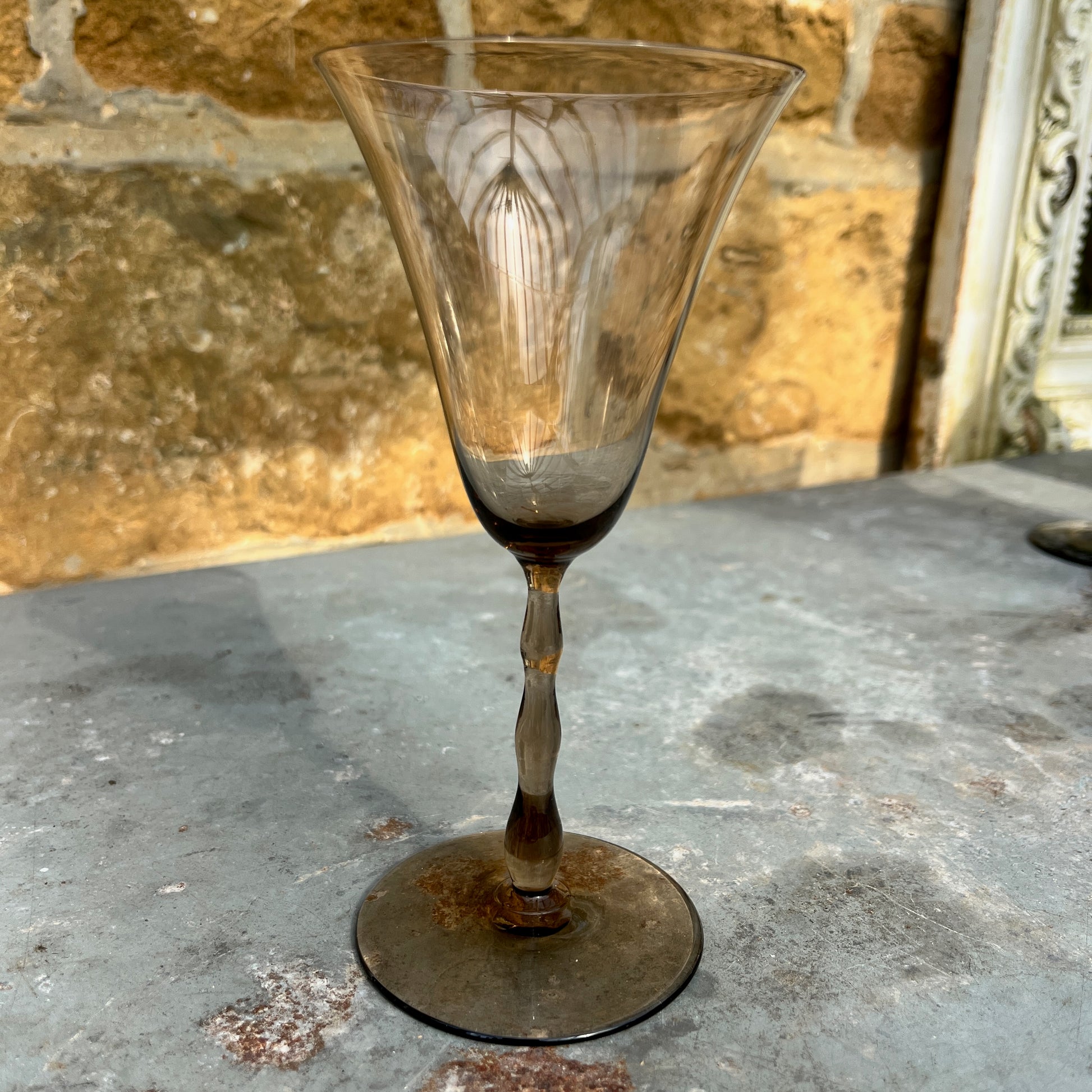 A set of five vintage Orrefors Rhapsody smoke wine glasses, designed by Sven Palmqvist for Orrefors, Sweden, circa 1959. These hand-blown, mid-century Scandinavian glasses feature a sleek, minimalist silhouette with a slightly flared bowl