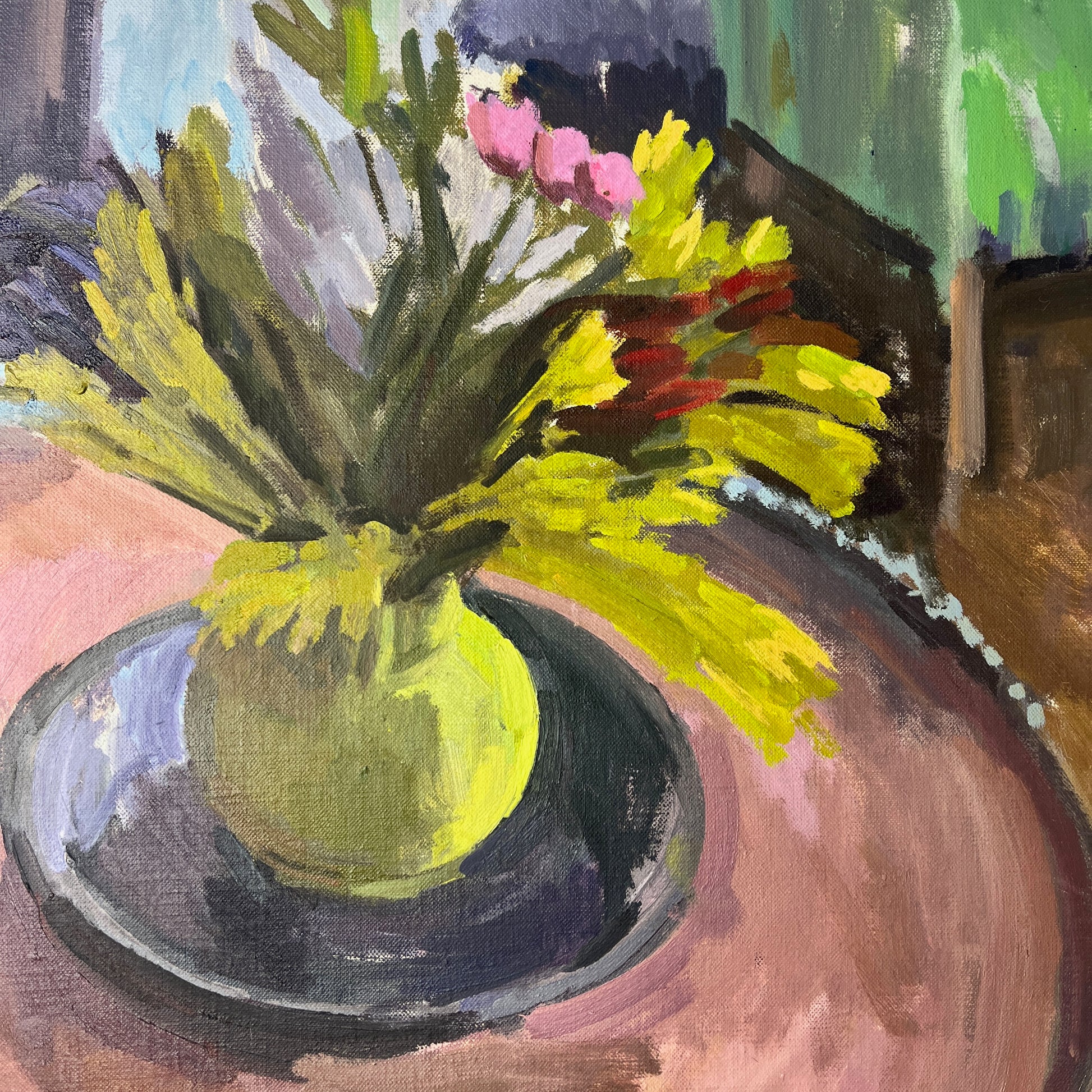 An oil-on-canvas still life painting capturing a serene living room scene, featuring a bouquet of pink tulips gracefully arranged in a green vase on a wooden table. In the room is a green armchair, and fire place, evoking a sense of quiet elegance. and coziness.
