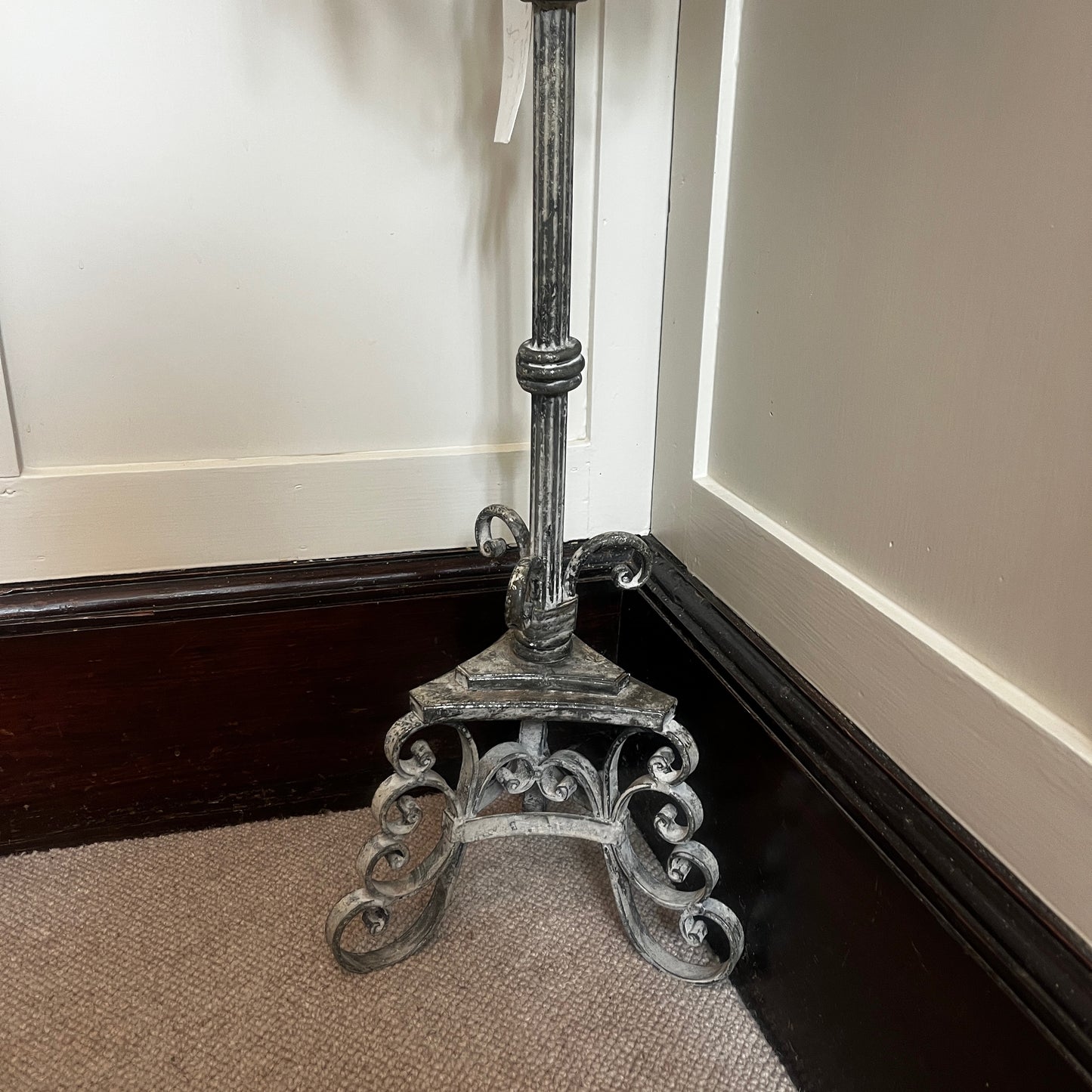 Vintage French tall metal candelabra in grey, featuring a single candle holder and a slender, elegant silhouette with a distressed aged finish.