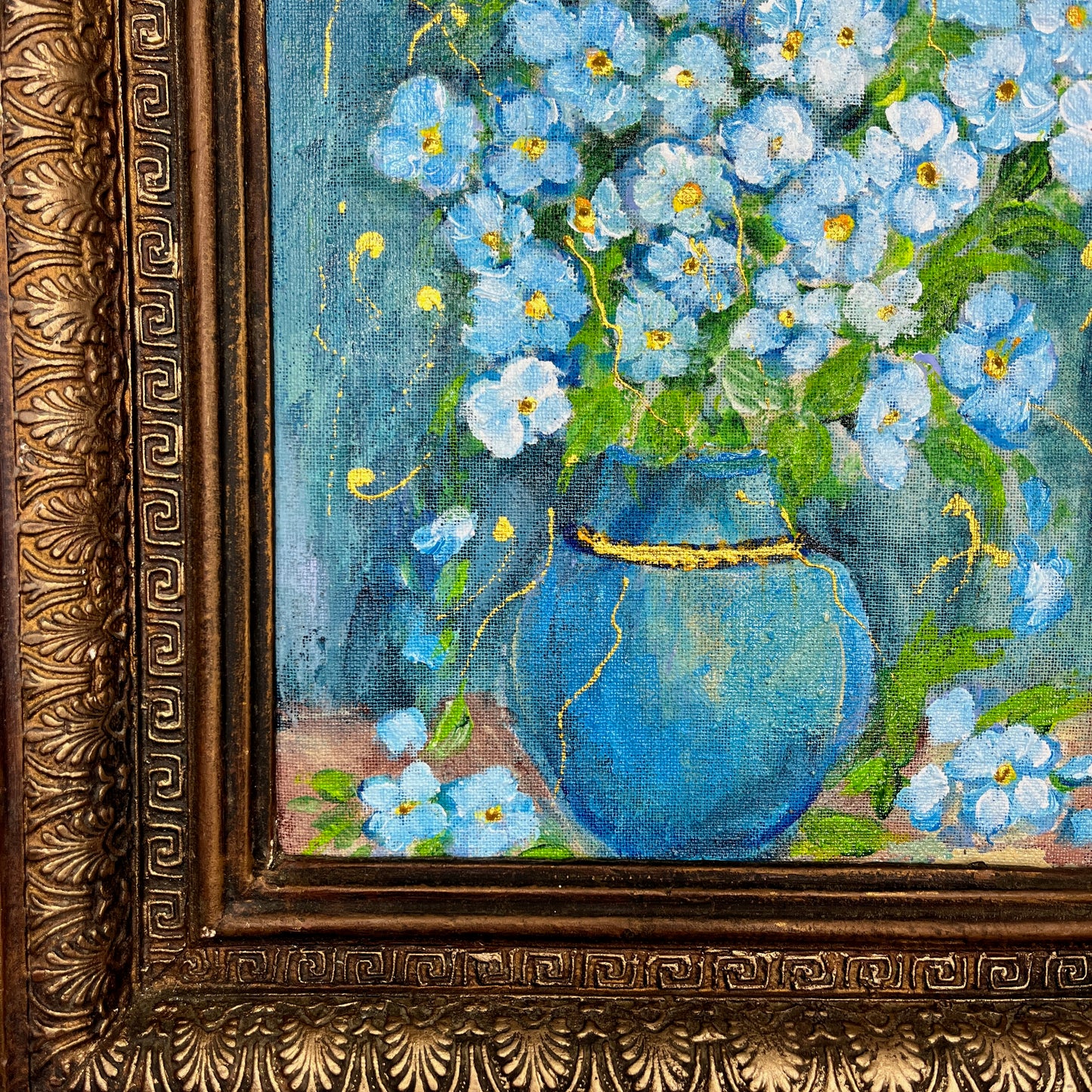 An oil on canvas painting featuring a vibrant bouquet of flowers, rendered in striking turquoise hues with accents of green and gold in a blue vase.