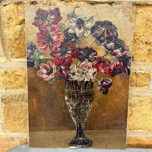 Vintage-style painting of a bouquet of flowers in a glass vase on a textured background.