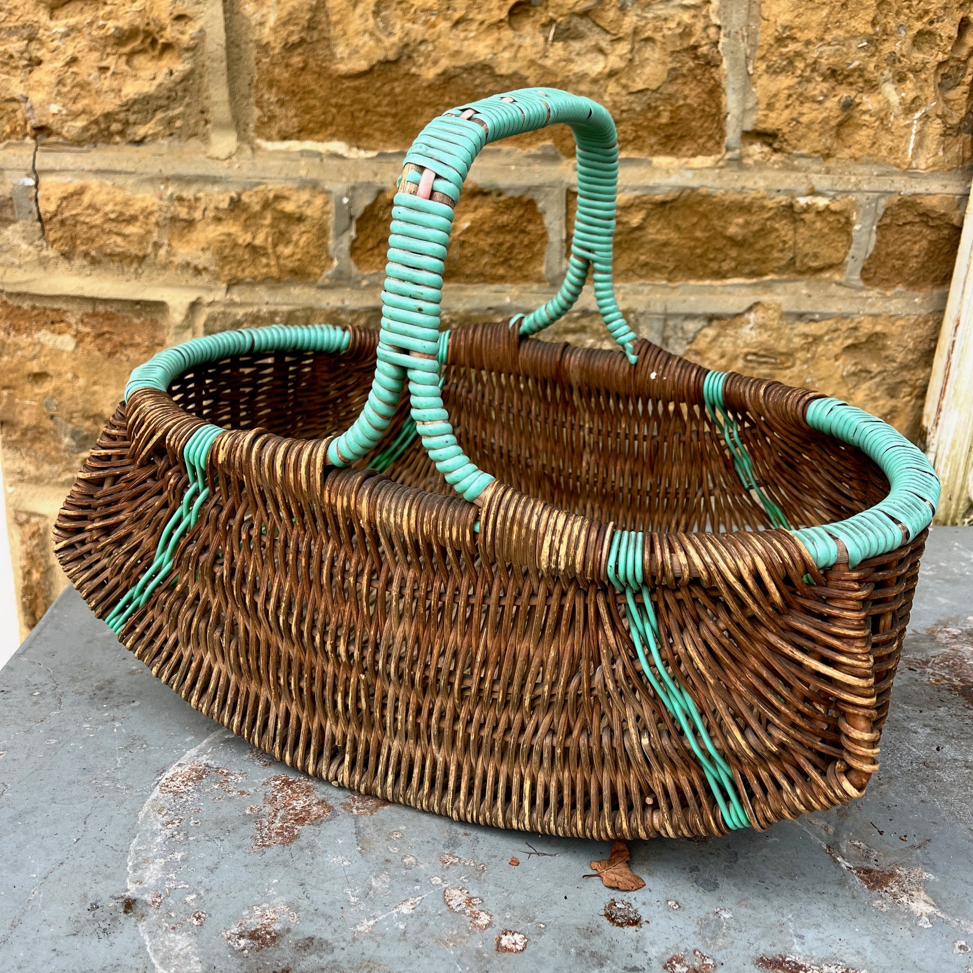 Assorted wicker baskets in various shapes and sizes, made from natural woven materials