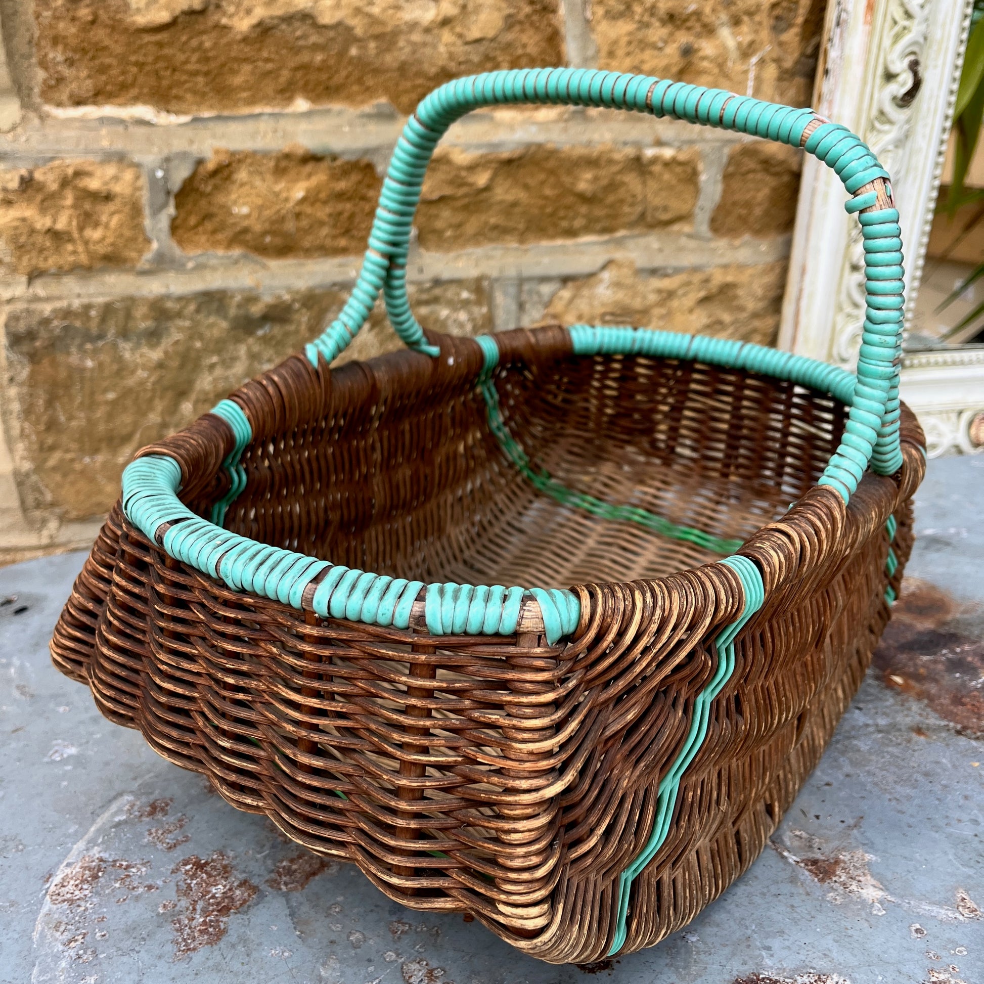 Assorted wicker baskets in various shapes and sizes, made from natural woven materials