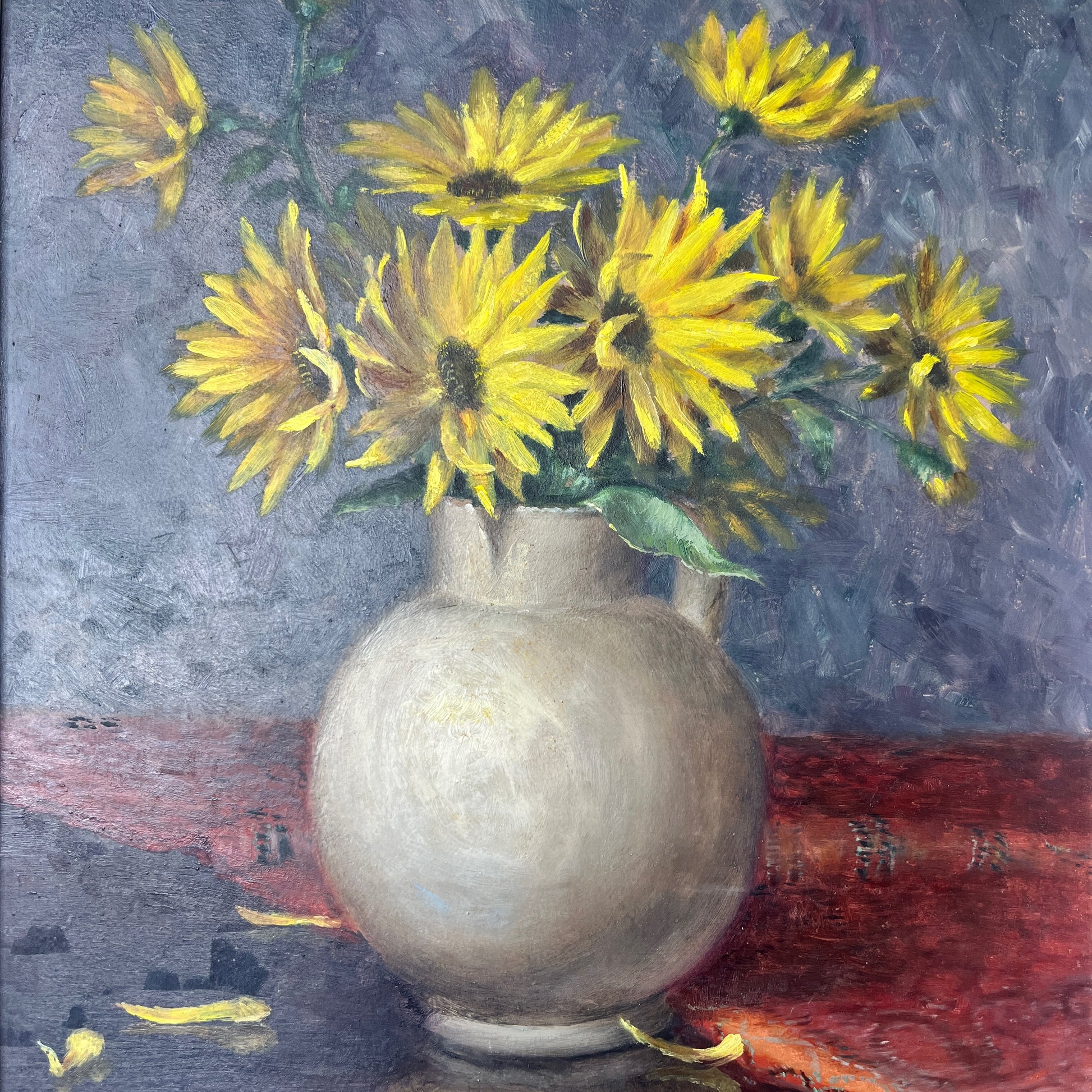 A vintage still life oil on board painting depicting a delicate bouquet of blooming yellow chrysanthemums in a grey vase, set against a softly lit table with subtle shadows and aged patina.