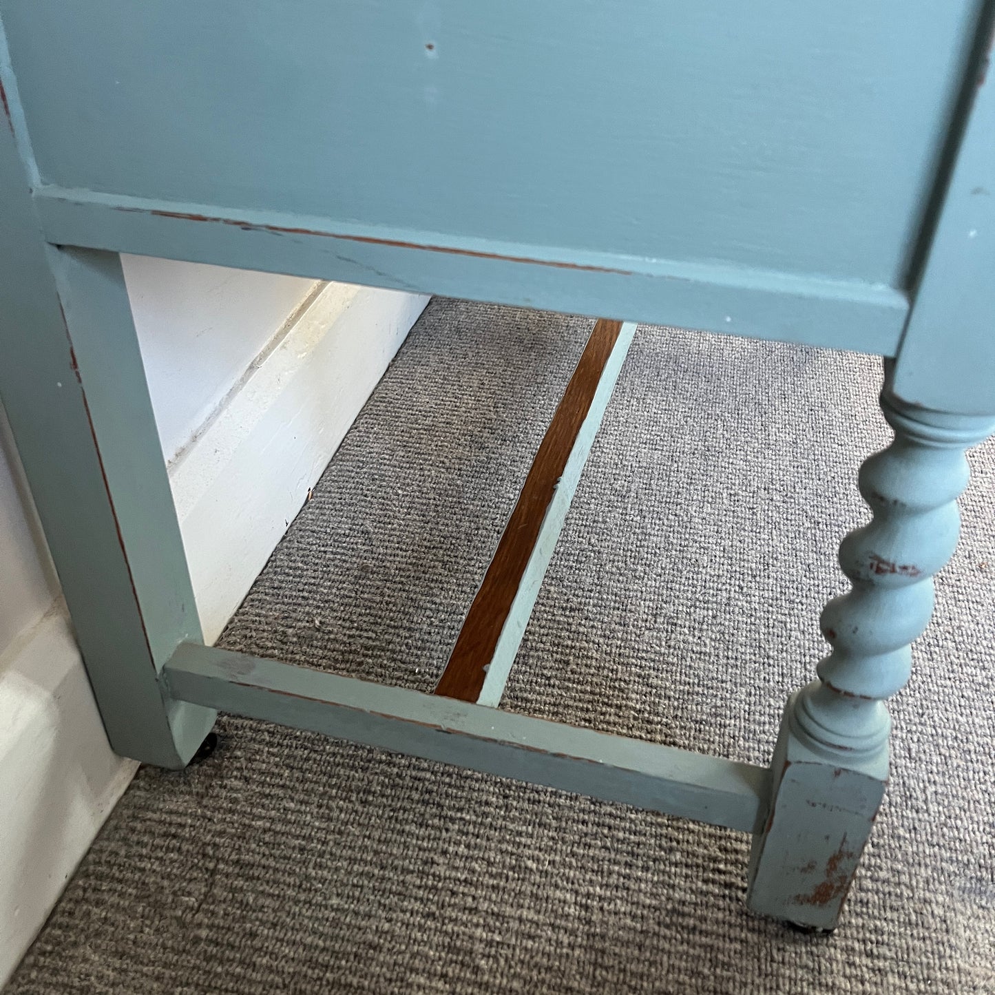 Antique wooden dressing table with a large rectangular mirror, with shelf under, featuring intricately carved barley twist legs and two drawers