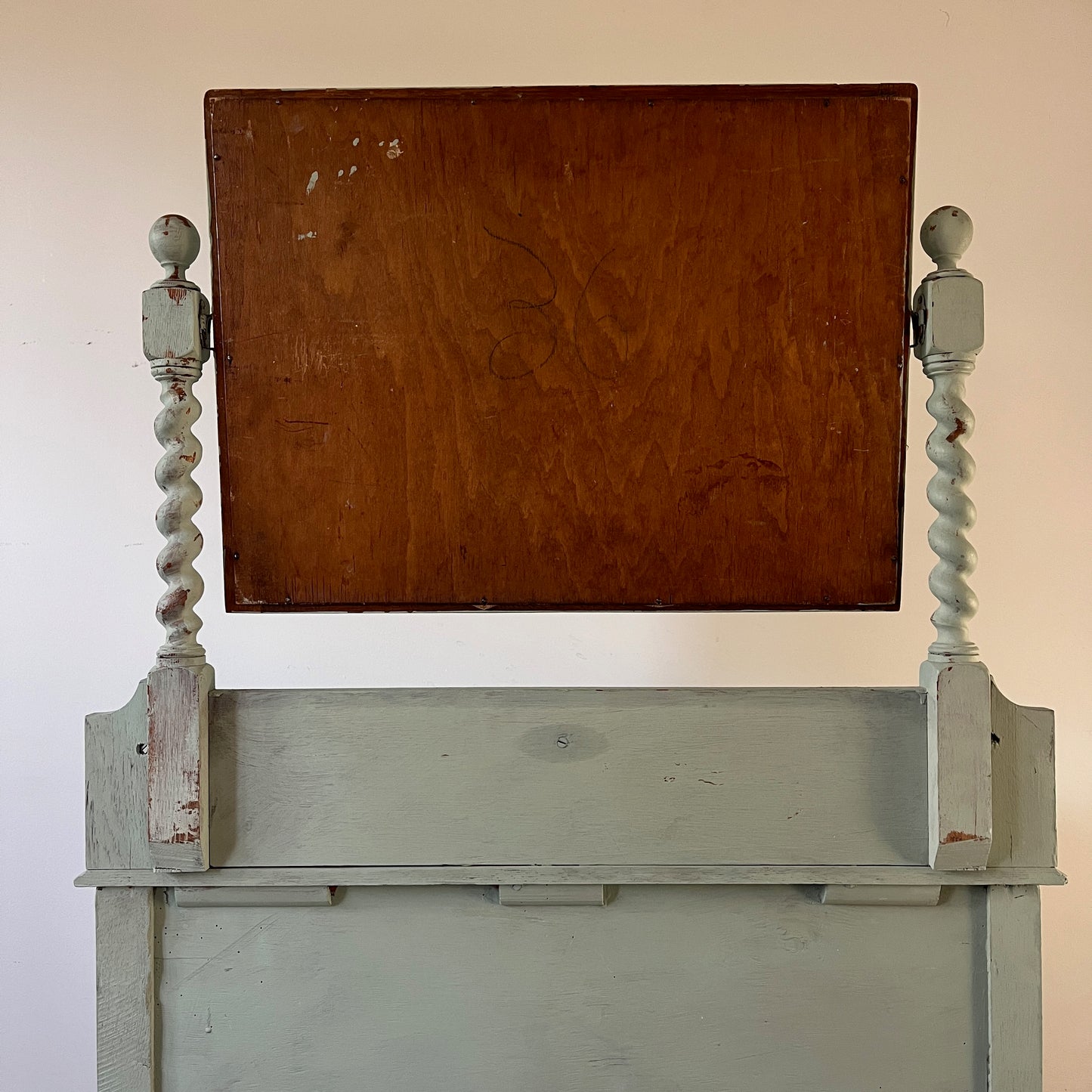 Antique wooden dressing table with a large rectangular mirror, with shelf under, featuring intricately carved barley twist legs and two drawers