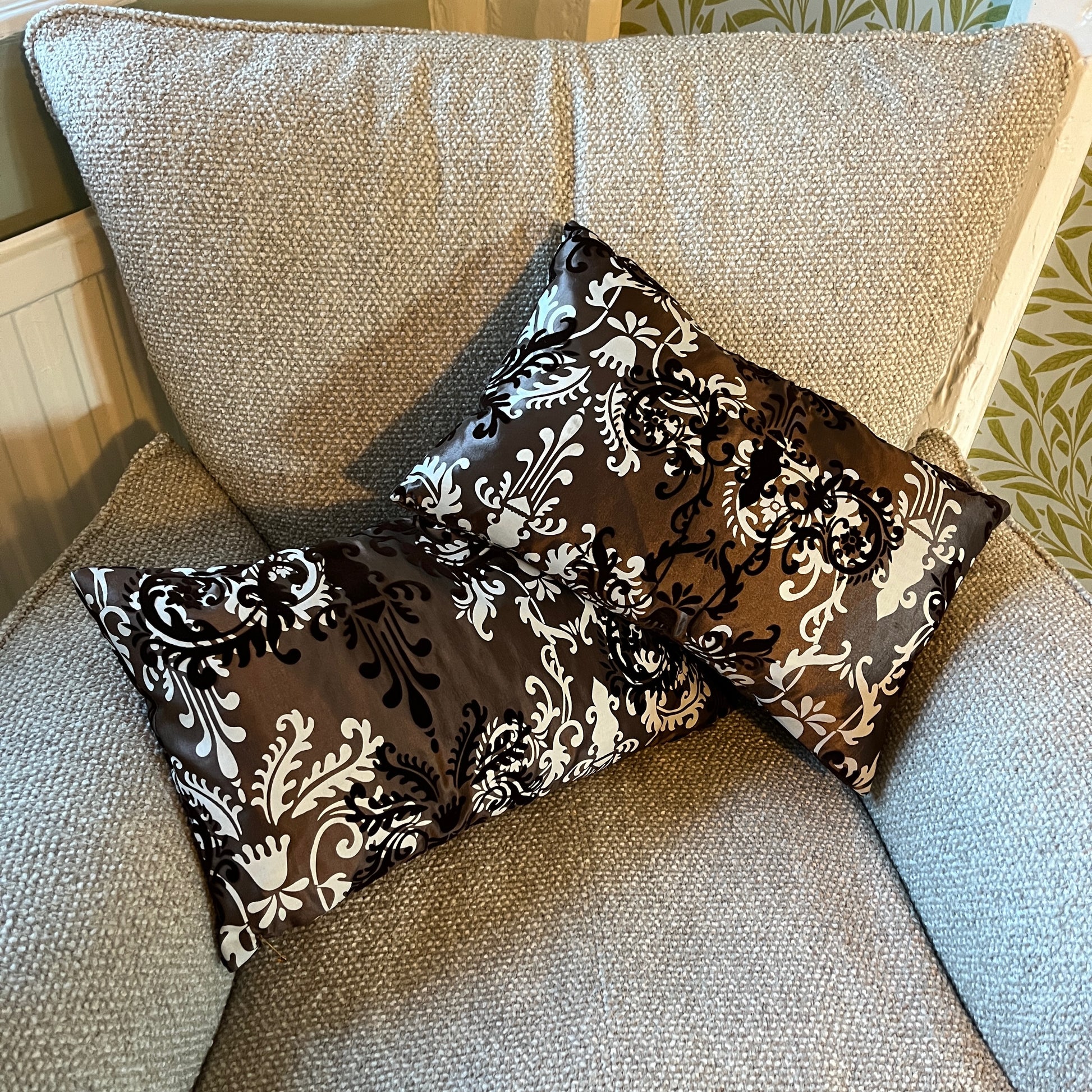 Hobbs brown silk cushion with white decorative detailing