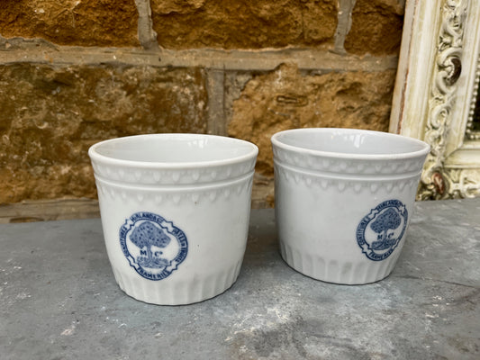 French marmalade pots rescued from a factory in the 1970's.  White with blue decorative detail on the front.