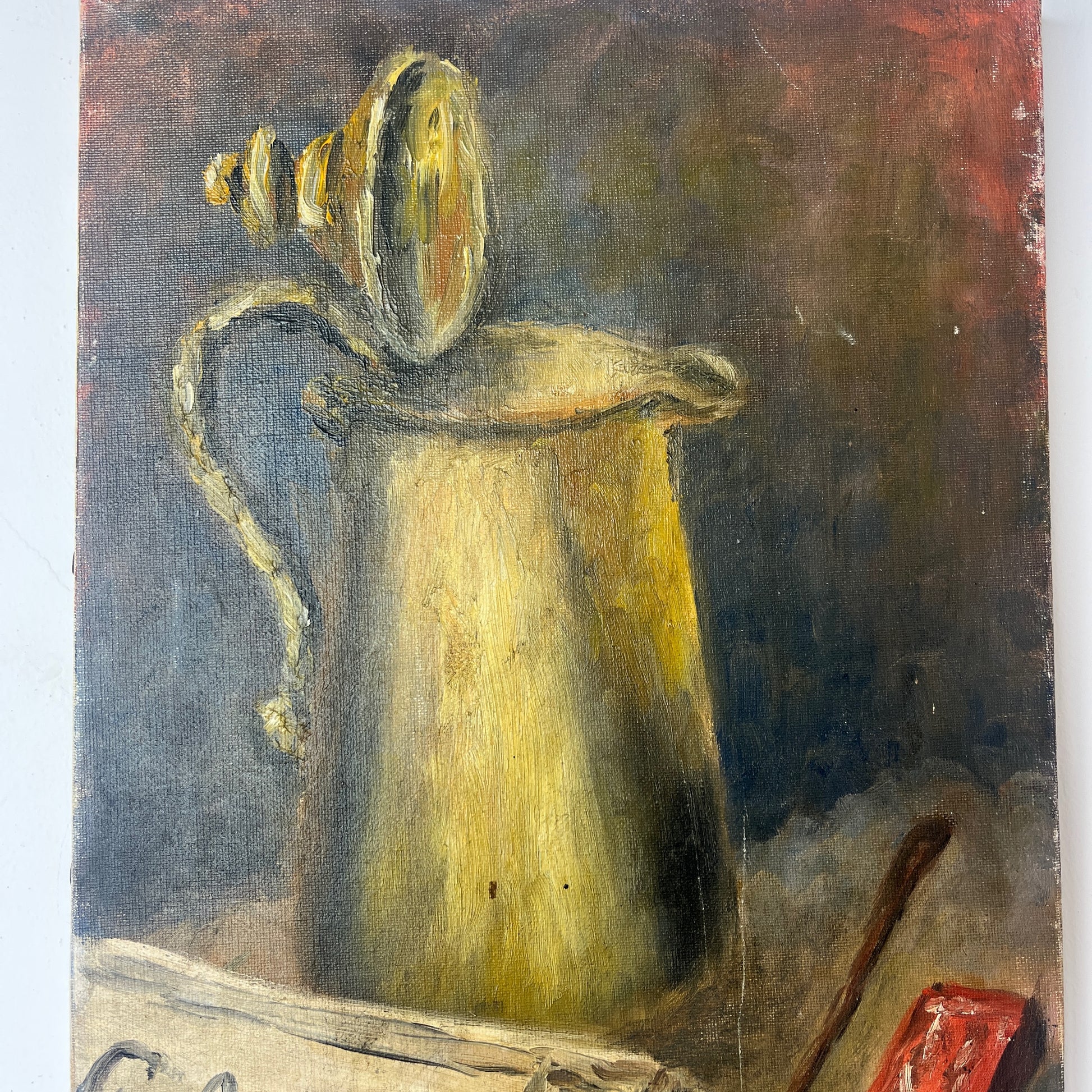 French oil on canvas still life of Le Figaro newspaper, a coffee pot, pipe and matches.  Gold, browns and reds in the painting.  Signed M Cartier