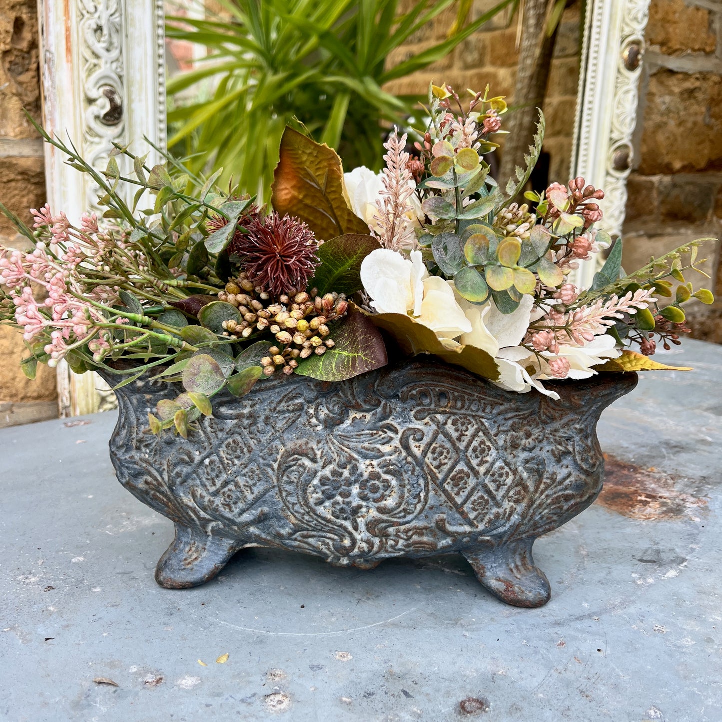 Very decorative vintage French jardinere which sits on four legs, ideal for potting plants