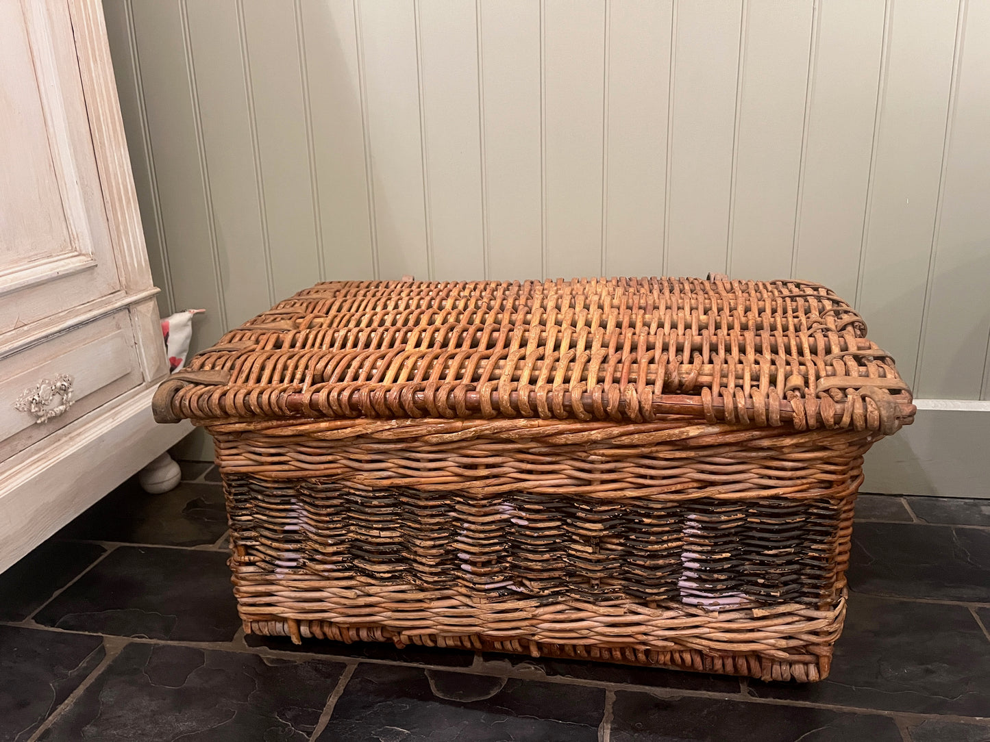 Vintage laundary basket made from wicker ideal for storing bedding or towels.