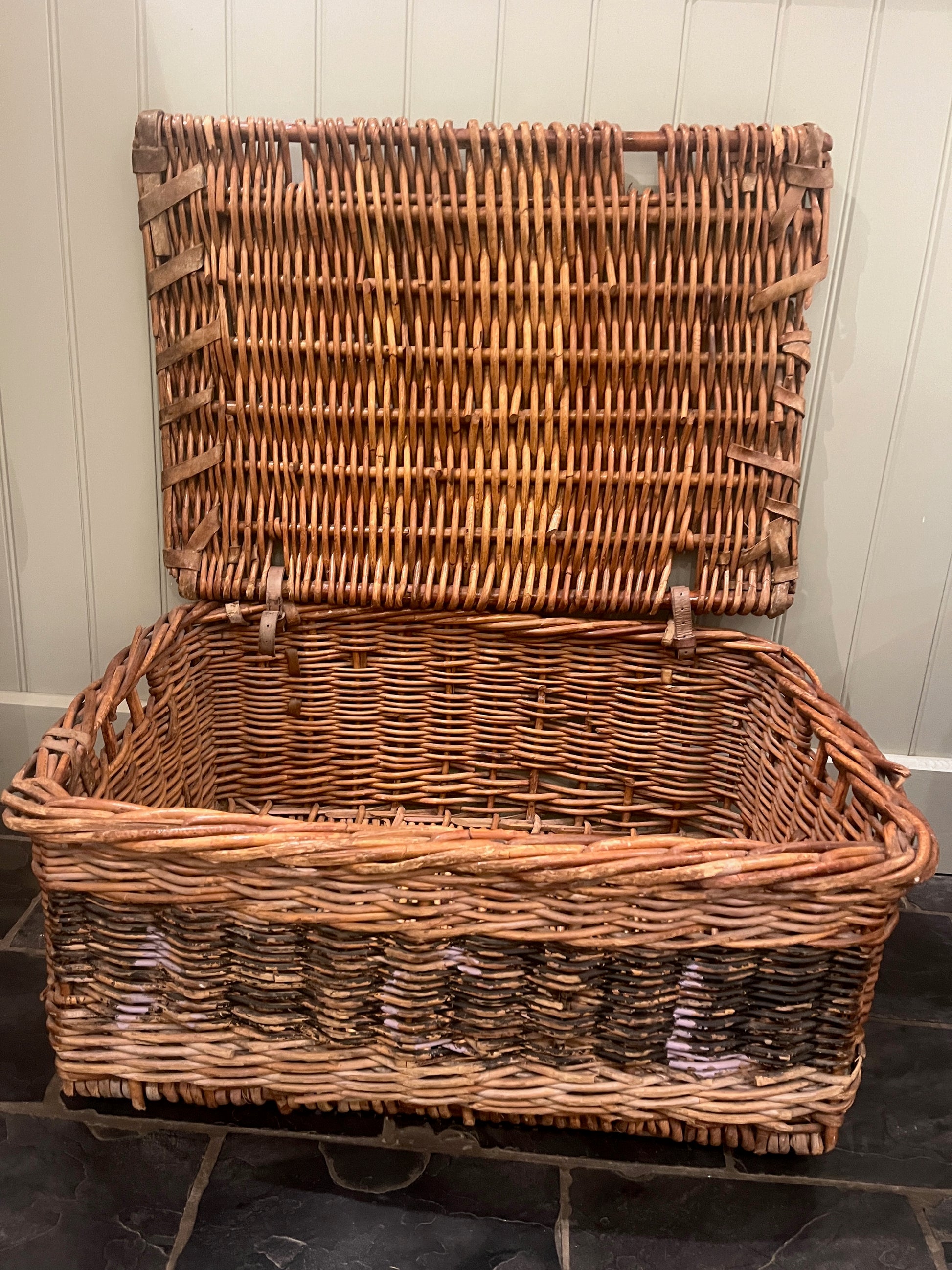 Vintage laundary basket made from wicker ideal for storing bedding or towels.
