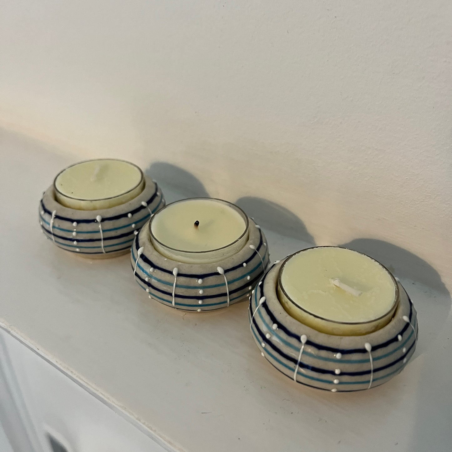 3 small decorative tea lights