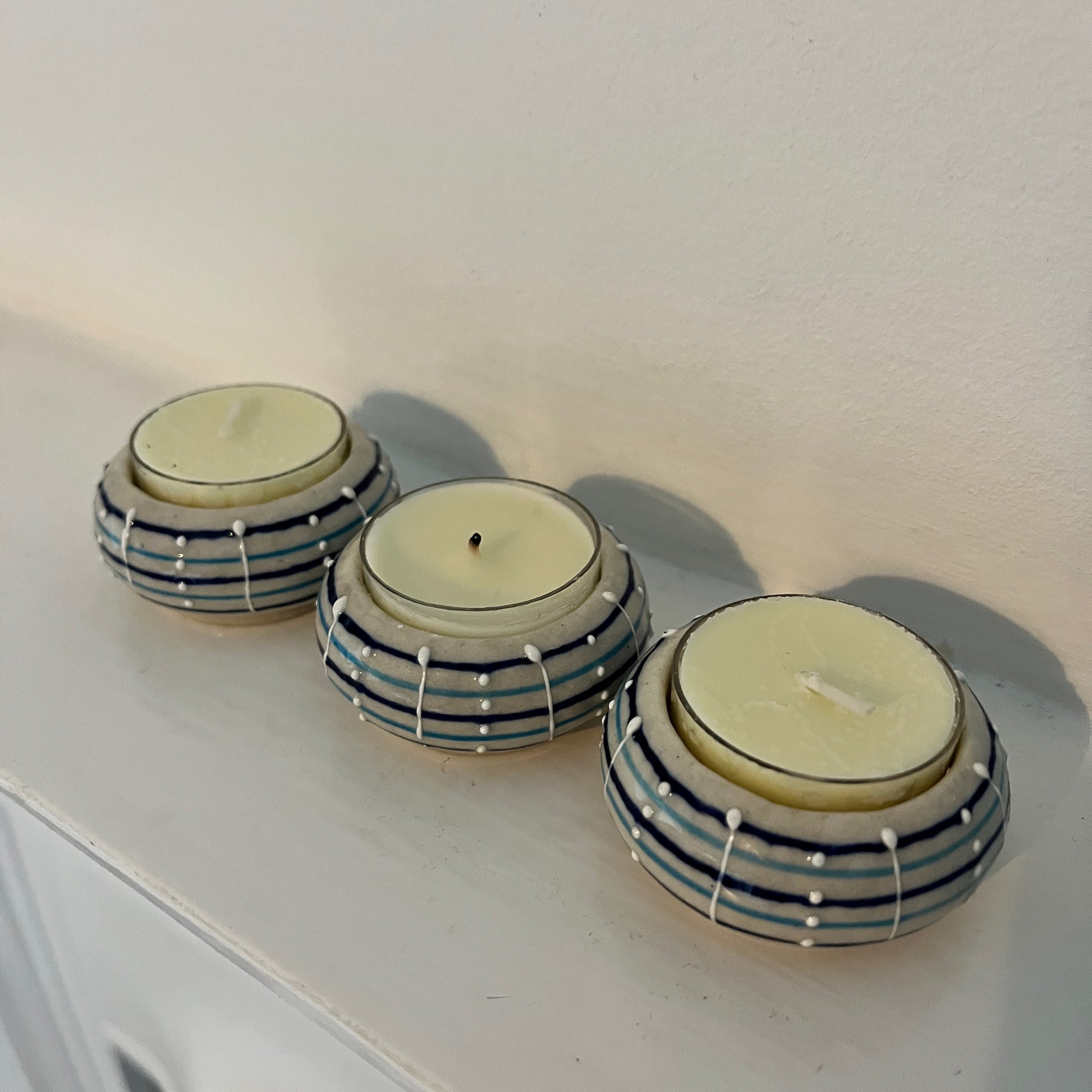 3 small decorative tea lights