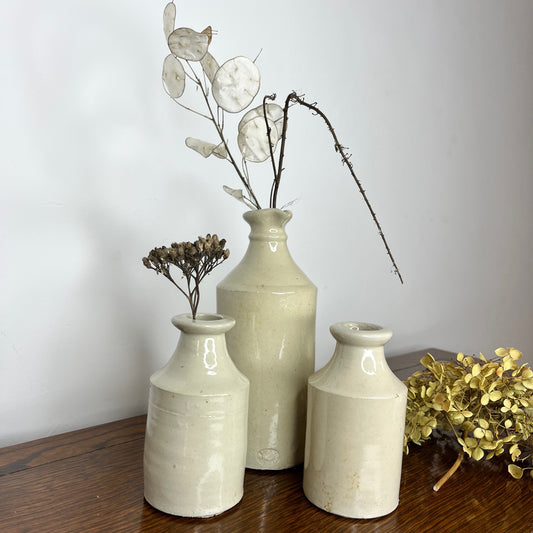 Victorian cream-colored ink pots with simple but elegant, vintage design