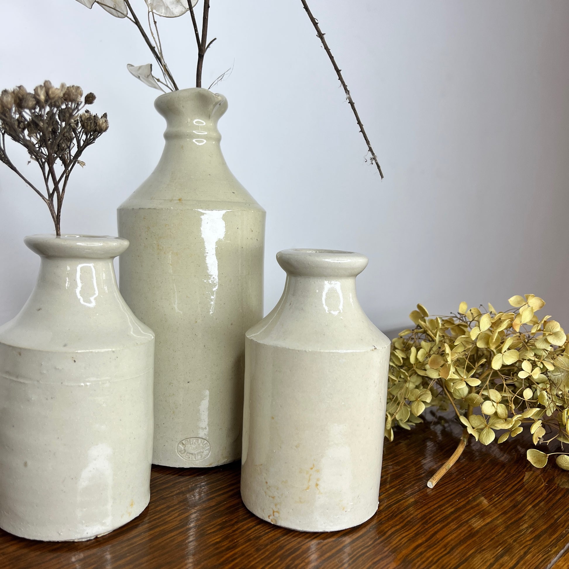 Victorian cream-colored ink pots with simple but elegant, vintage design