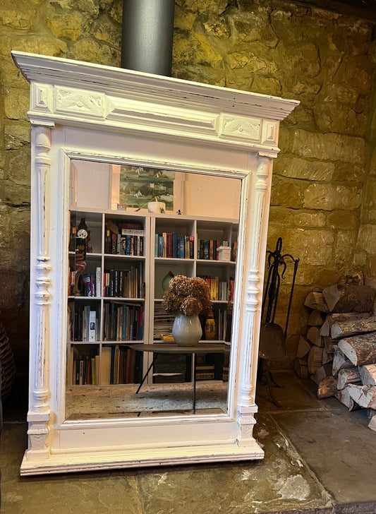 Large continental vintage over mantle mirror