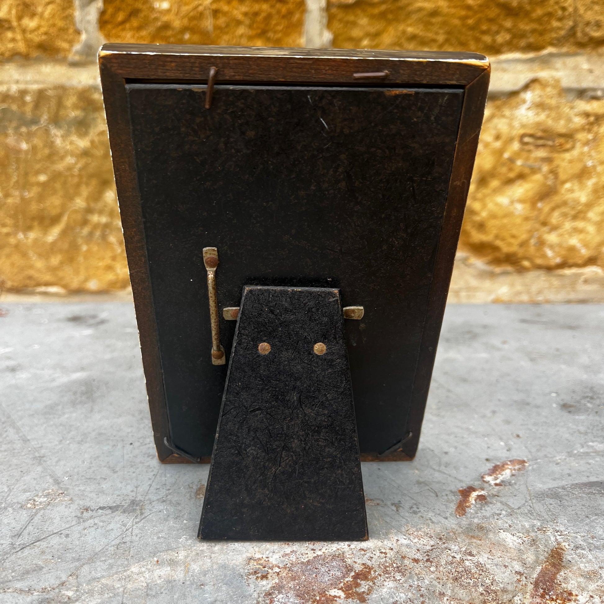 A vintage British Art Deco 'Foframe' wooden photo frame with a distinctive geometric design and richly toned wood finish. Dating from the 1930s–1940s, the frame features clean lines and stepped Art Deco styling