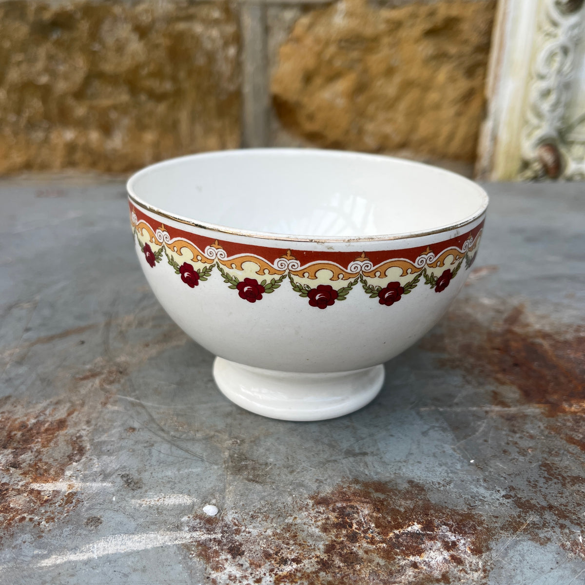 Vintage café au lait bowls with a maroon geometric pattern around the rim.