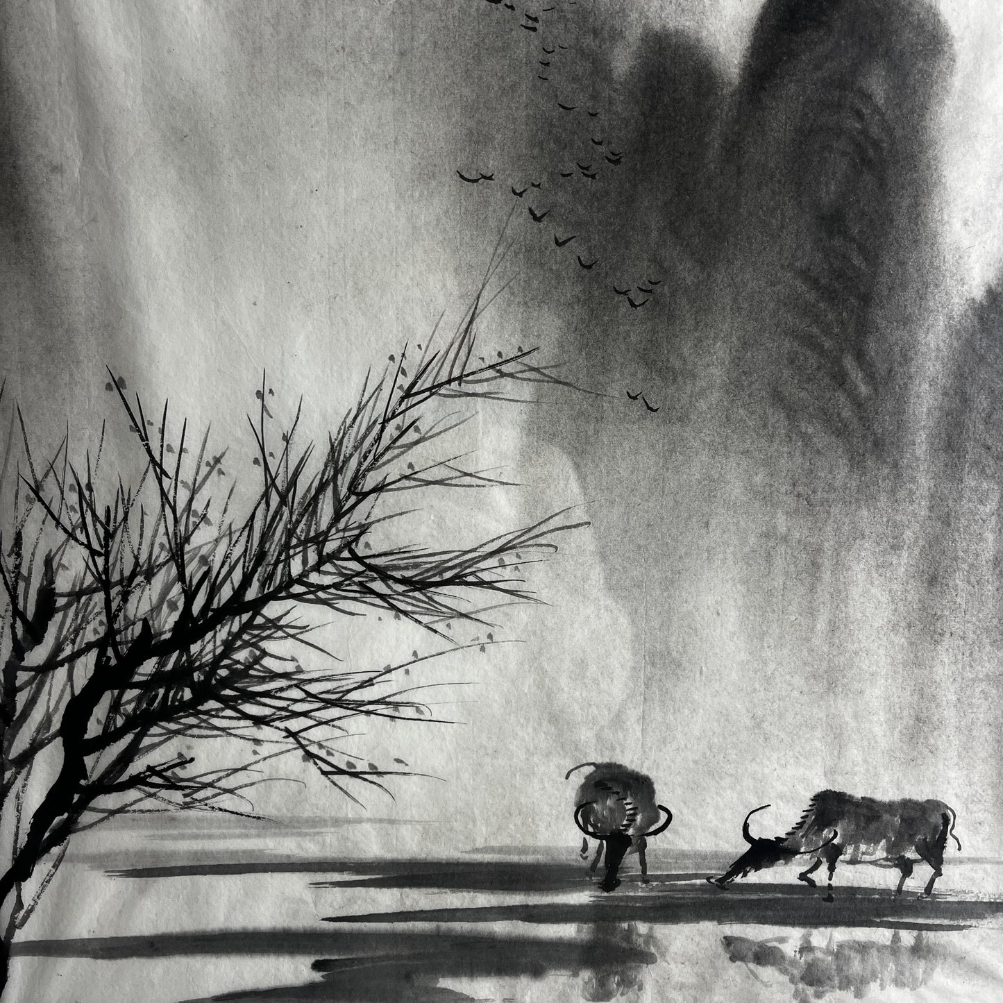 Original Chinese ink landscape painting on paper, attributed to Zhong Qi Min (Qi Min Zhong), depicting misty mountains and a tranquil riverside scene with two water buffalo. Trees appear in the foreground, with birds flying overhead, rendered in traditional expressive brushwork.