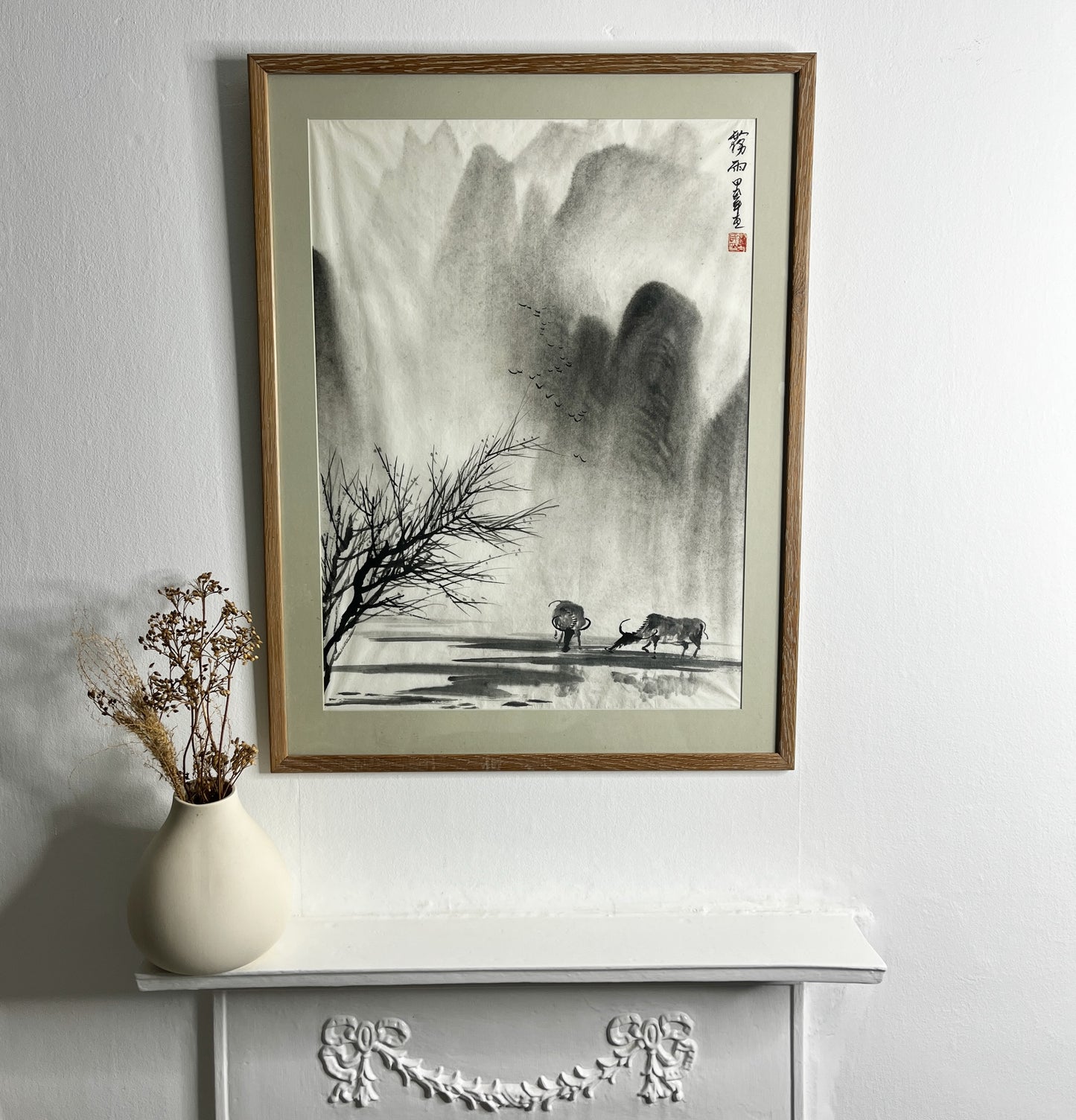 Original Chinese ink landscape painting on paper, attributed to Zhong Qi Min (Qi Min Zhong), depicting misty mountains and a tranquil riverside scene with two water buffalo. Trees appear in the foreground, with birds flying overhead, rendered in traditional expressive brushwork.
