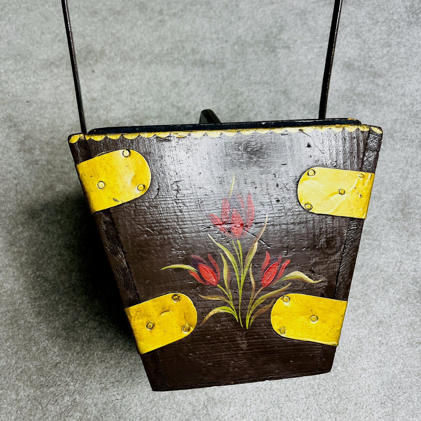 Floral-decorated bucket with wooden handles, featuring a removable inner tray. The piece has a vintage-style design with painted floral motifs and practical, rustic functionality.