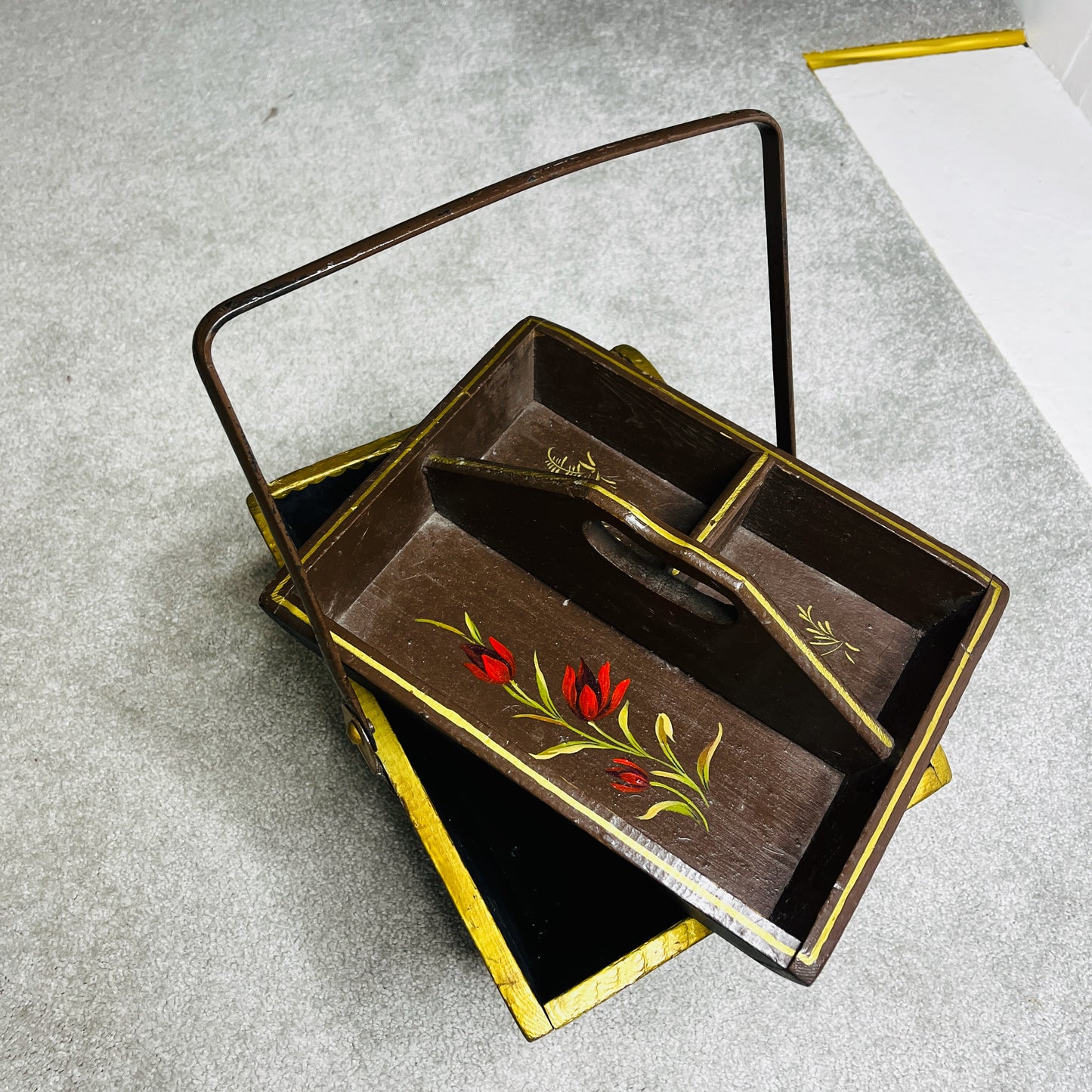 Floral-decorated bucket with wooden handles, featuring a removable inner tray. The piece has a vintage-style design with painted floral motifs and practical, rustic functionality.