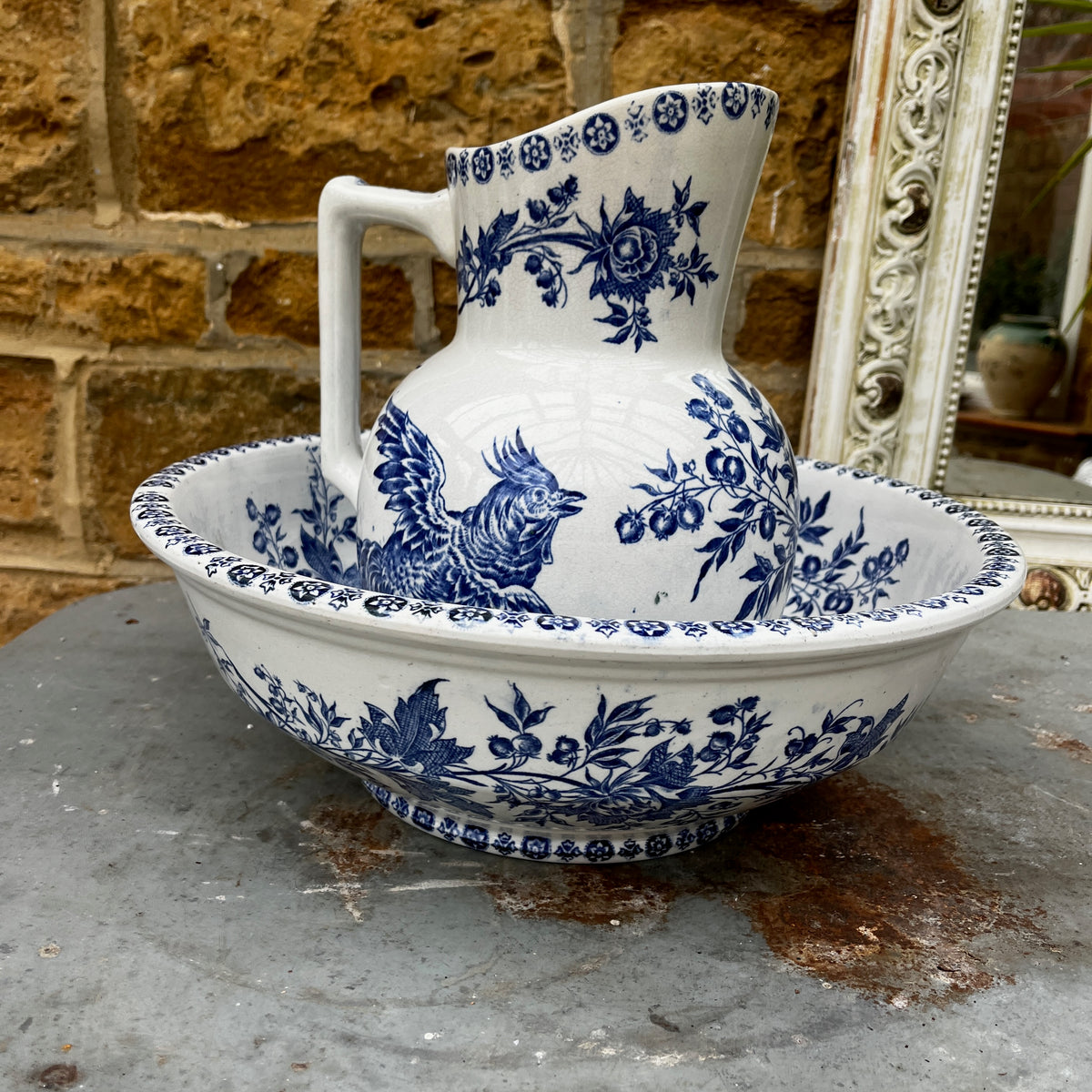 Antique French Sarreguemines blue and white transferware wash jug and bowl, decorated with a traditional cockerel pattern.