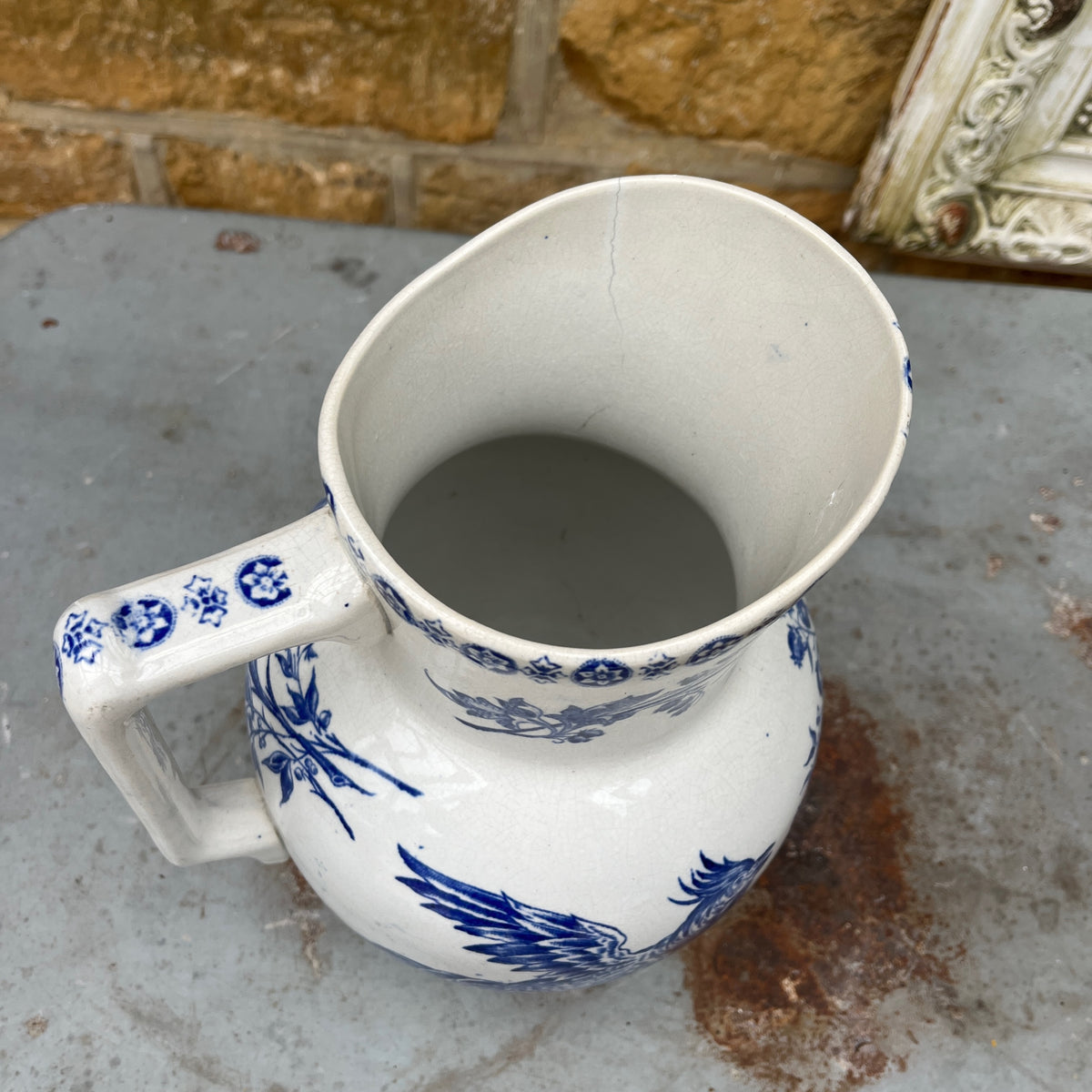 Antique French Sarreguemines blue and white transferware wash jug and bowl, decorated with a traditional cockerel pattern.