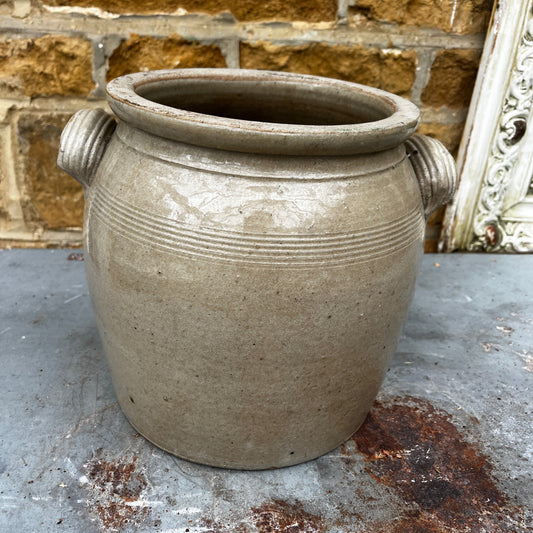 Vintage French confit pot in a soft cream glaze, featuring a traditional rounded form and rustic farmhouse character.
