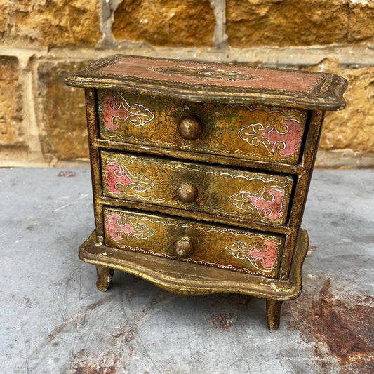 Vintage Italian Florentine miniature three-drawer chest of drawers with ornate carved and gilded decoration