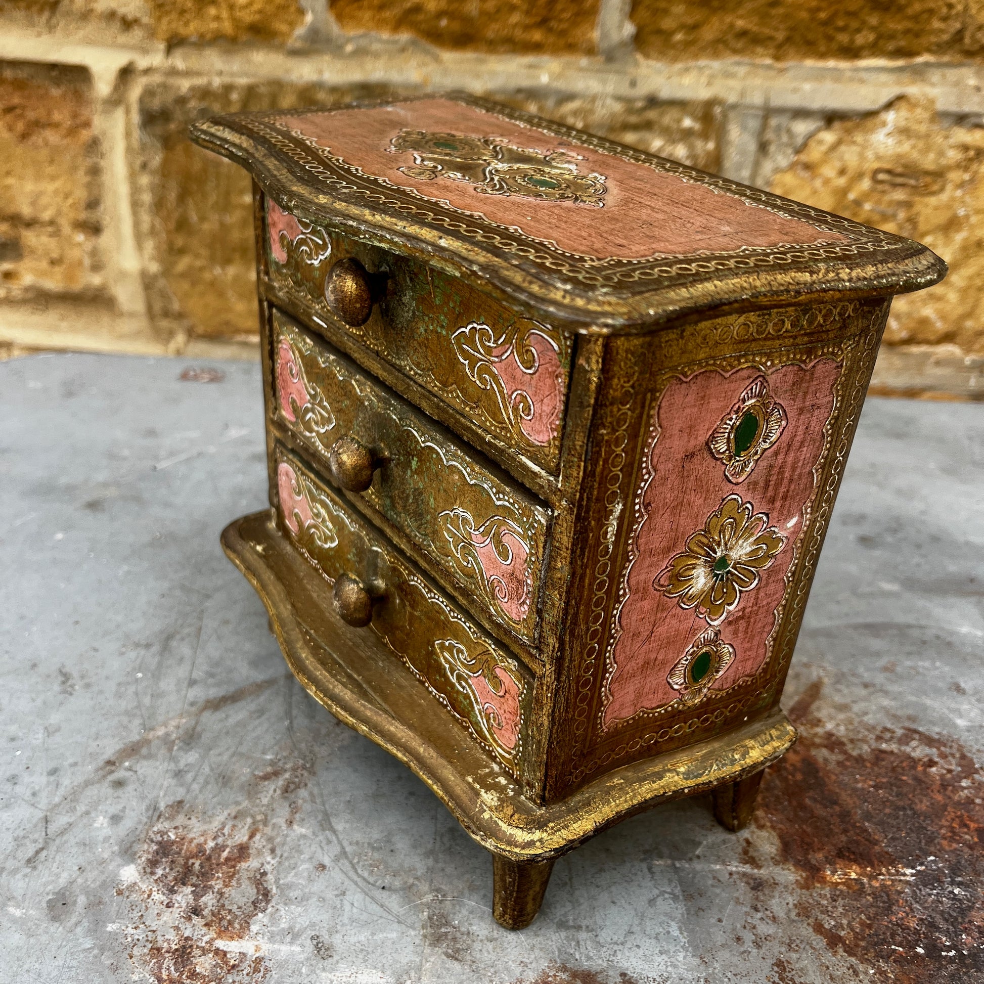 Vintage Italian Florentine miniature three-drawer chest of drawers with ornate carved and gilded decoration