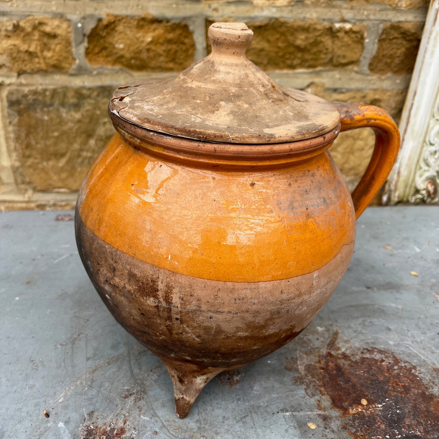 19th Century French Glazed Ochre Ceramic Jug With a Lid and Three Legs
