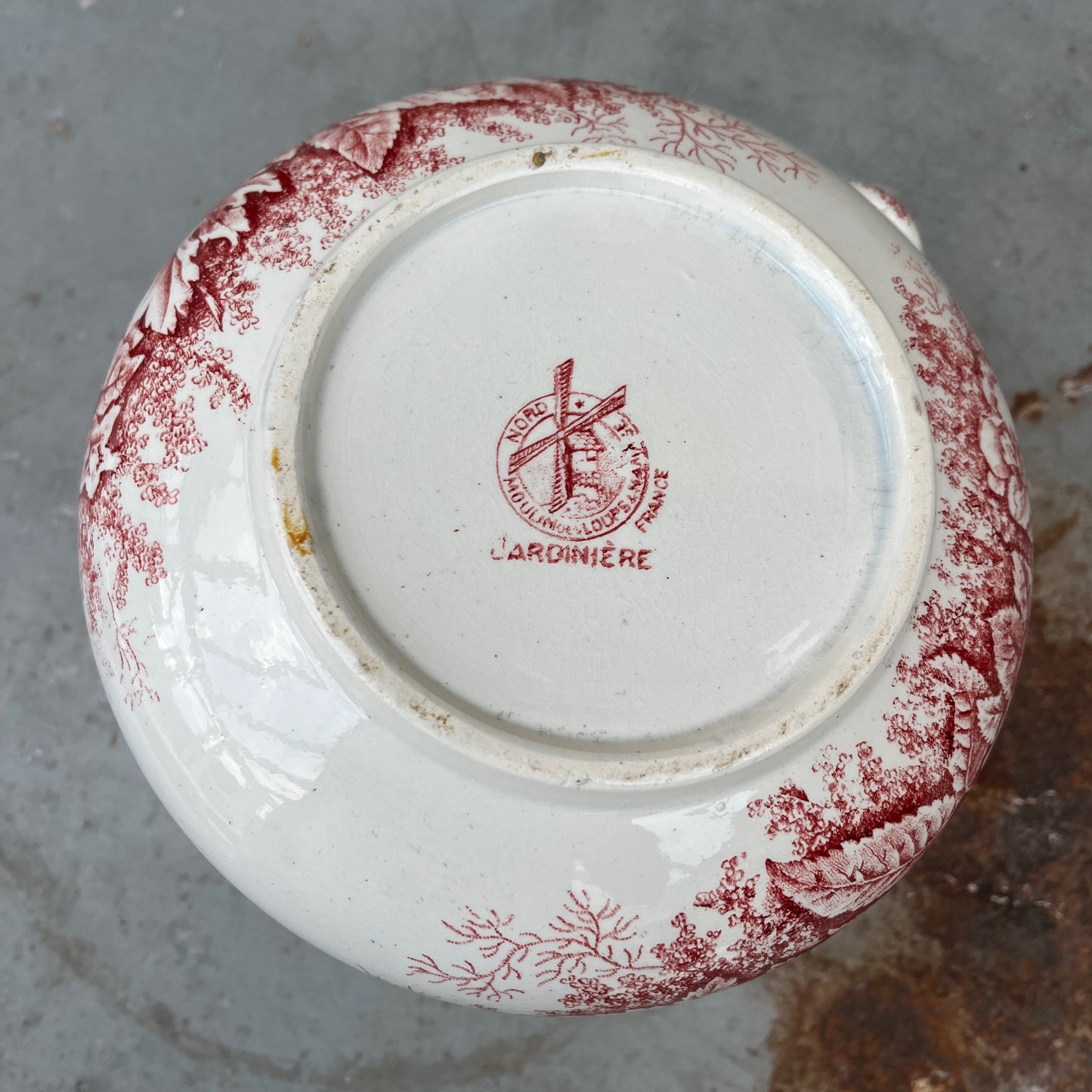 Antique French red transferware ironstone jug by Moulin des Loups, decorated with intricate red patterns and traditional detailing