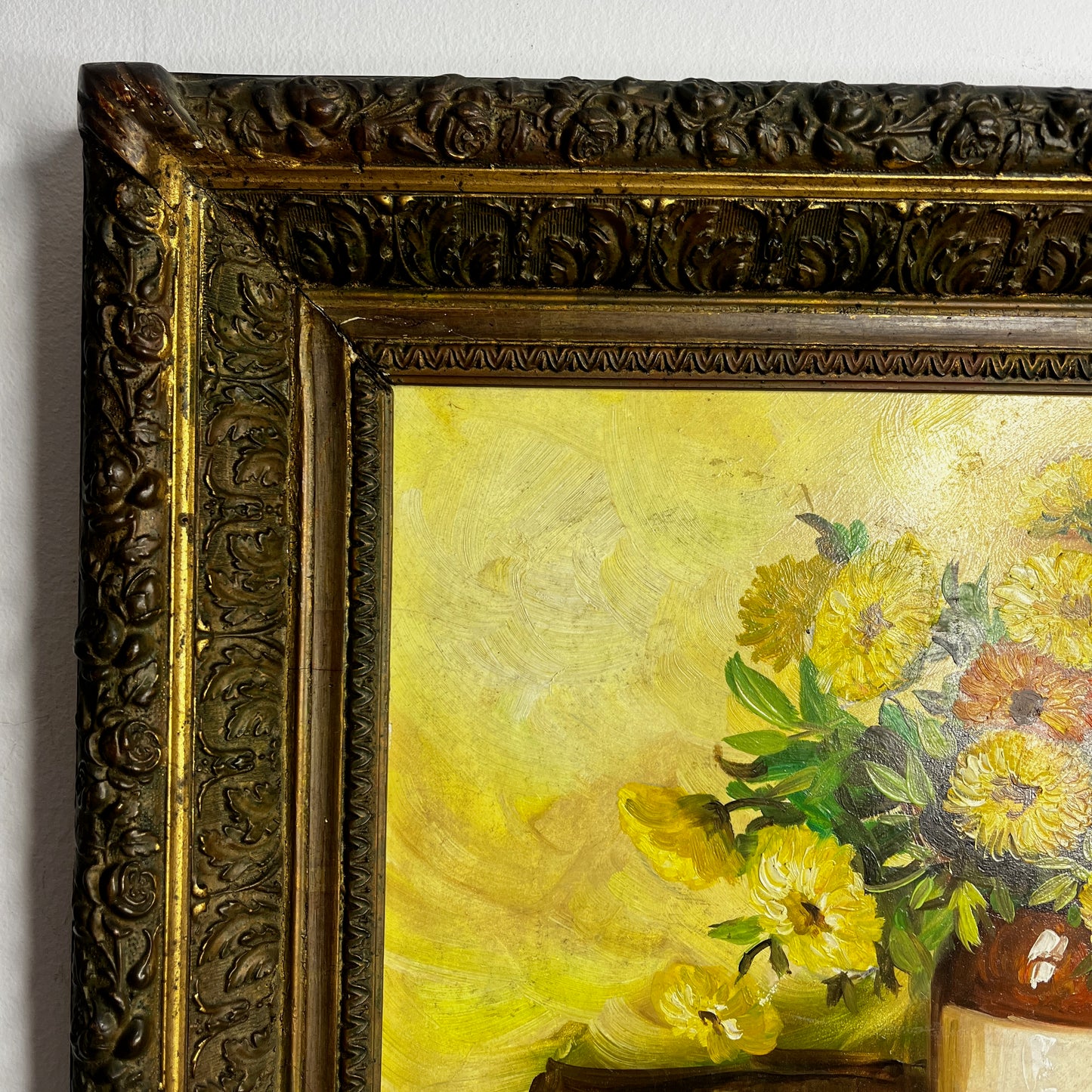 Vintage French still life painting of marigolds, featuring warm golden tones and a classic rustic composition in a rustic stoneware pot.