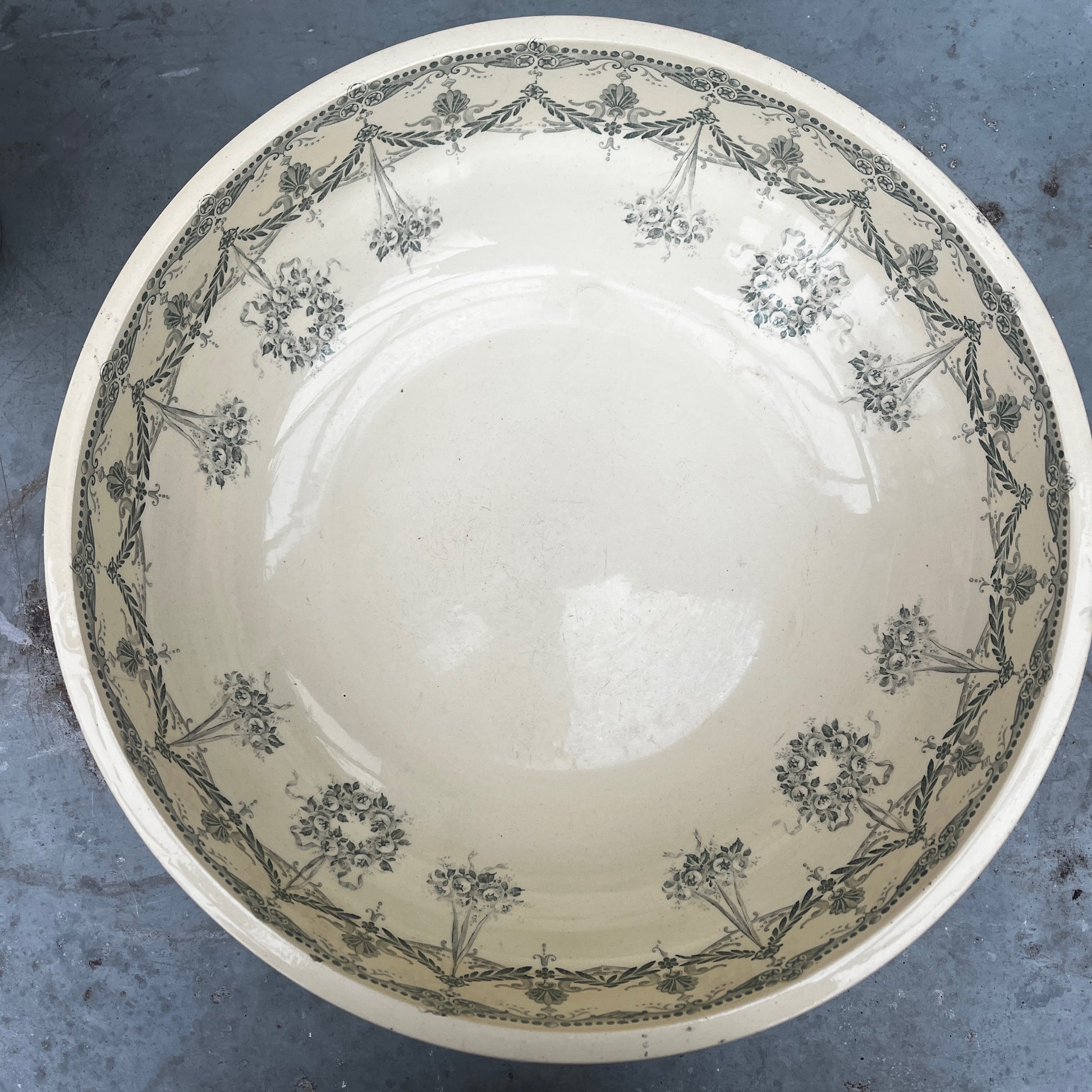 Antique French wash set in green and cream Terre de Fer pottery, stamped HB & Cie Massena, including a basin and jug with classic transferware decoration