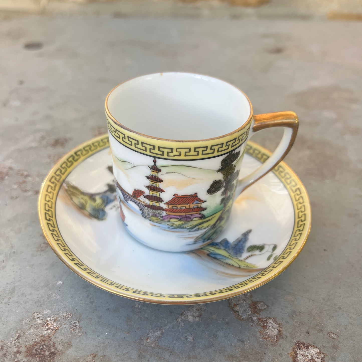 Vintage Japanese coffee / tea set by Noritake, crafted from fine porcelain with gilded accents. The set includes cups, saucers, sugar bowl, milk jug and a teapot, featuring delicate hand-painted designs and a classic, elegant finish.