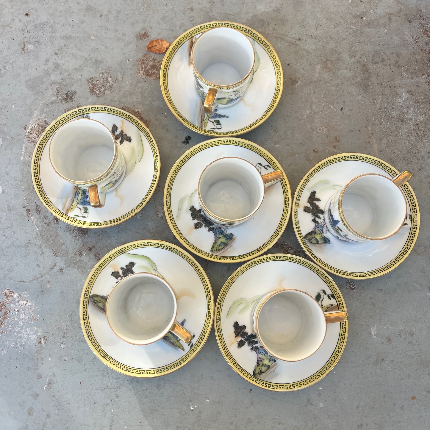 Vintage Japanese coffee / tea set by Noritake, crafted from fine porcelain with gilded accents. The set includes cups, saucers, sugar bowl, milk jug and a teapot, featuring delicate hand-painted designs and a classic, elegant finish.