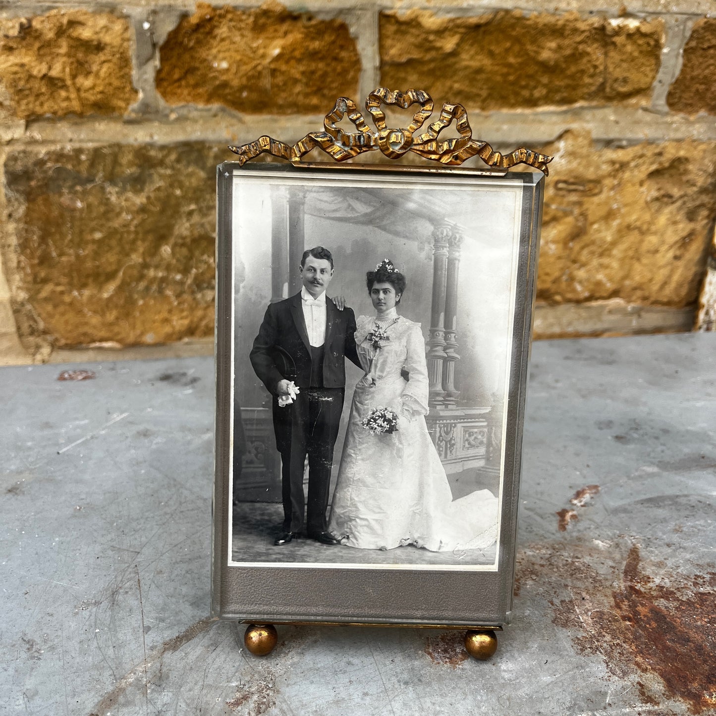 Antique French bevelled glass photo frame with an elegant vintage design and decorative detailing