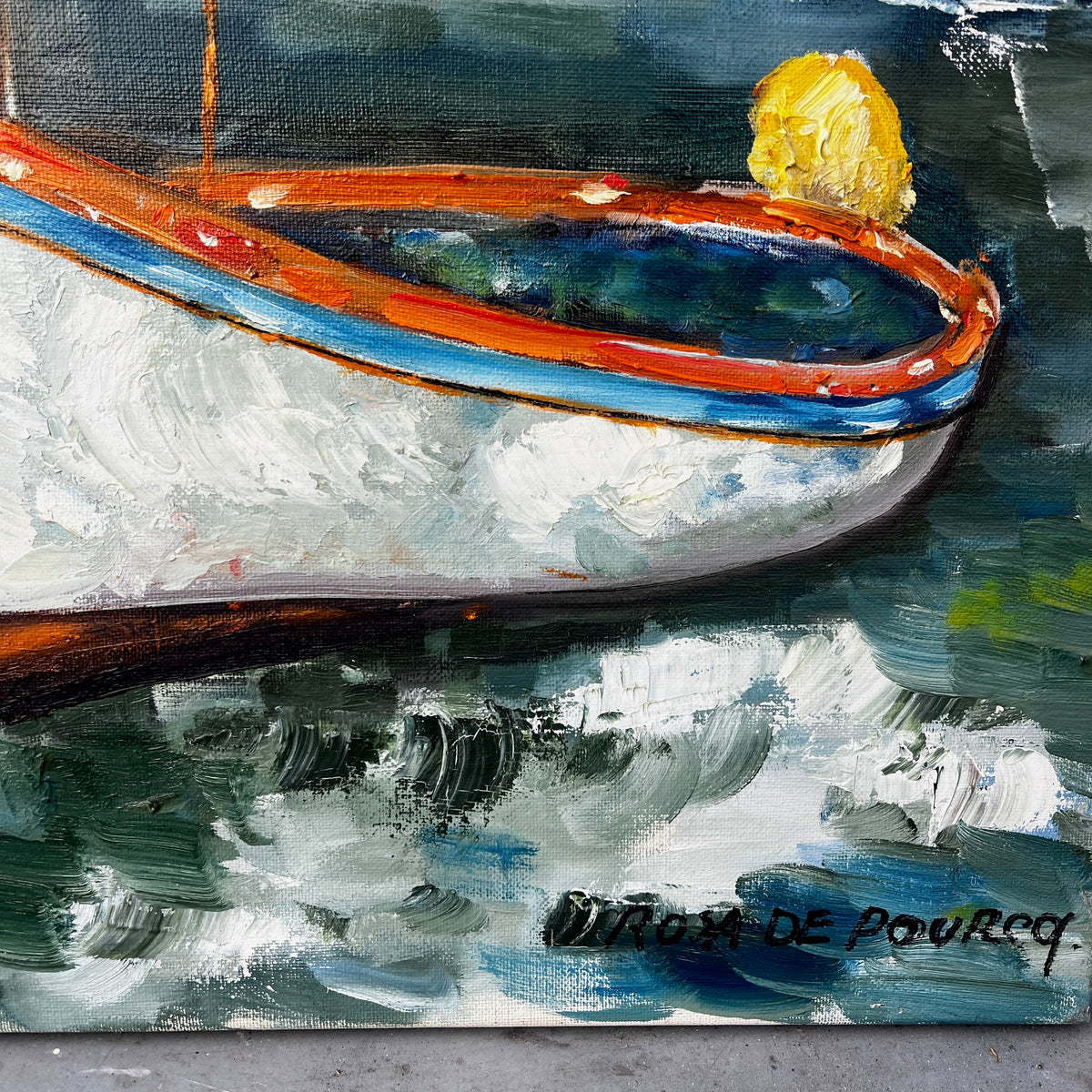 An oil painting of two small boats on dark, textured water. The painting features expressive brushstrokes in navy, green, white, and orange-red, with a signature in the bottom right corner.