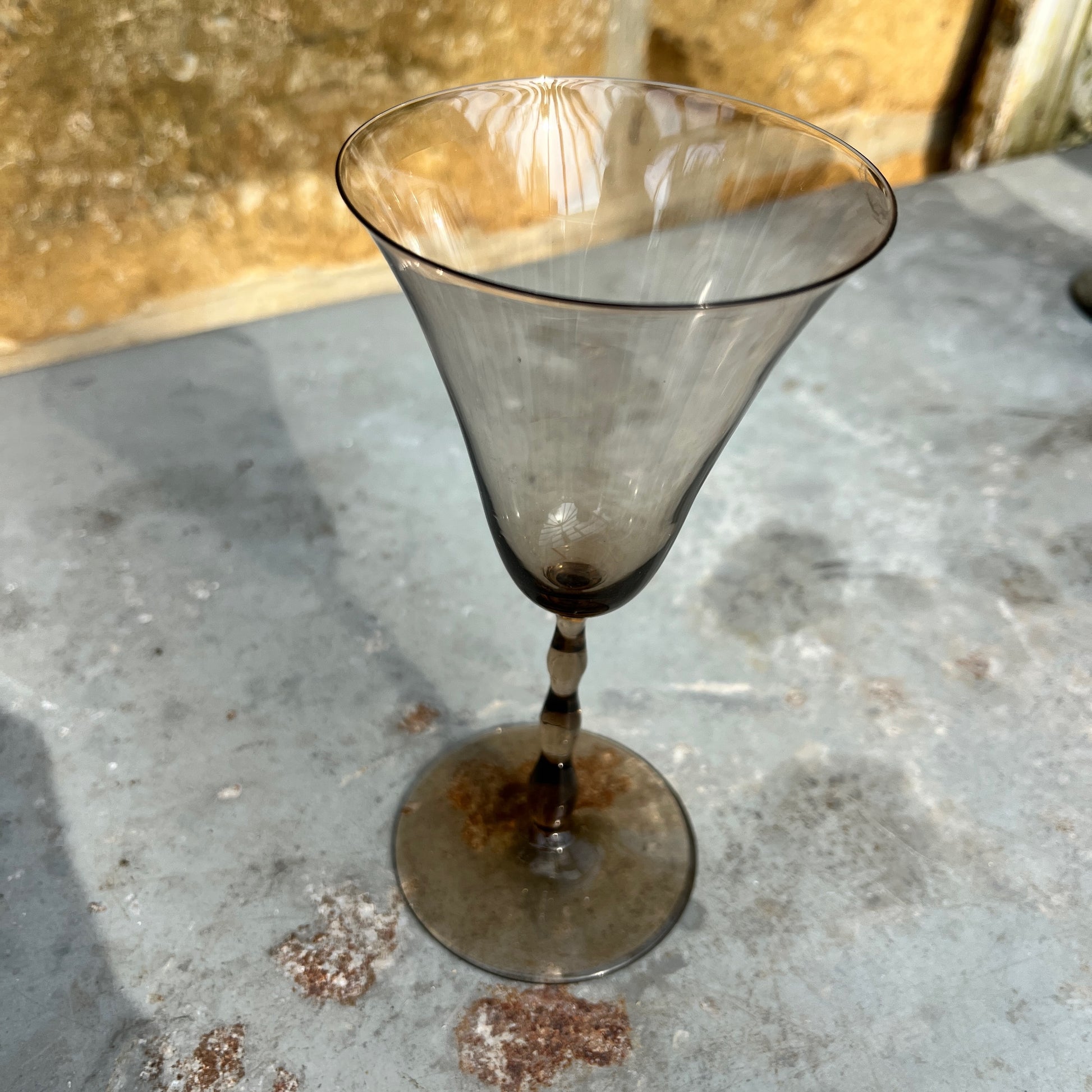 A set of five vintage Orrefors Rhapsody smoke wine glasses, designed by Sven Palmqvist for Orrefors, Sweden, circa 1959. These hand-blown, mid-century Scandinavian glasses feature a sleek, minimalist silhouette with a slightly flared bowl