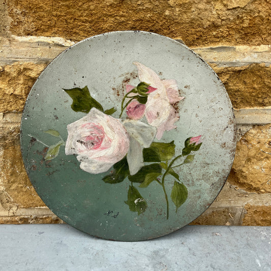 Decorative  vintage plate with a painting of roses 